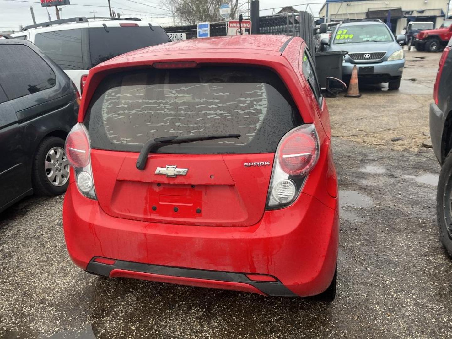 2014 RED CHEVROLET SPARK 1LT Auto (KL8CD6S95EC) with an 1.2L L4 16V DOHC engine, AUTOMATIC transmission, located at 2303 West Mt. Houston, Houston, 77038, (281) 507-3956, 29.771597, -95.339569 - Photo#1