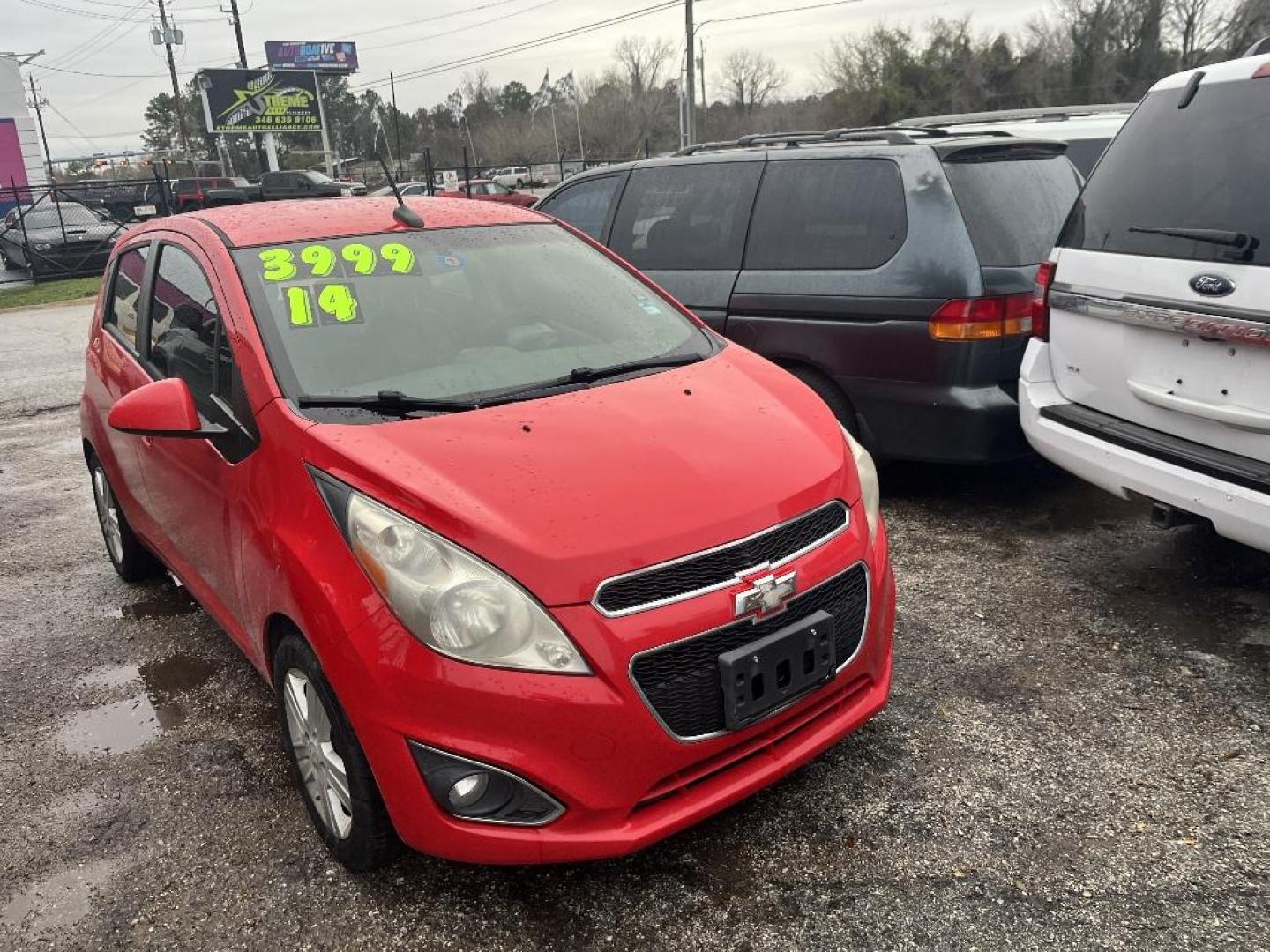 2014 RED CHEVROLET SPARK 1LT Auto (KL8CD6S95EC) with an 1.2L L4 16V DOHC engine, AUTOMATIC transmission, located at 2303 West Mt. Houston, Houston, 77038, (281) 507-3956, 29.771597, -95.339569 - Photo#5