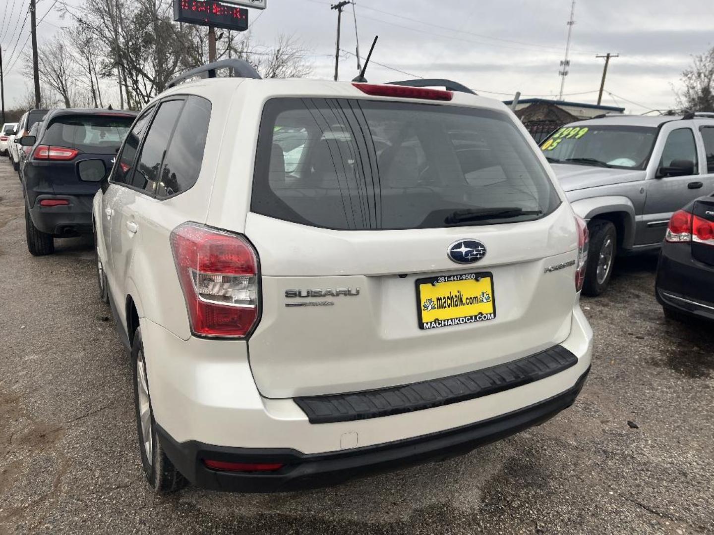 2015 WHITE SUBARU FORESTER 2.5i Premium (JF2SJABC8FH) with an 2.5L H4 SOHC 16V engine, AUTOMATIC transmission, located at 2303 West Mt. Houston, Houston, 77038, (281) 507-3956, 29.771597, -95.339569 - Photo#2