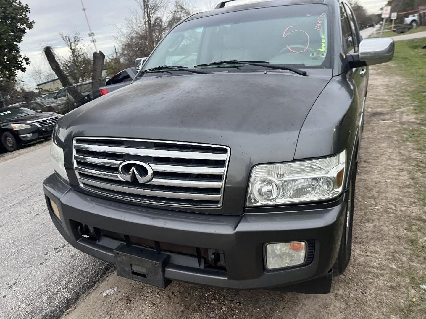 2005 BROWN INFINITI QX56 RWD (5N3AA08A65N) with an 5.6L V8 DOHC 32V engine, AUTOMATIC transmission, located at 2303 West Mt. Houston, Houston, 77038, (281) 507-3956, 29.771597, -95.339569 - Photo#0