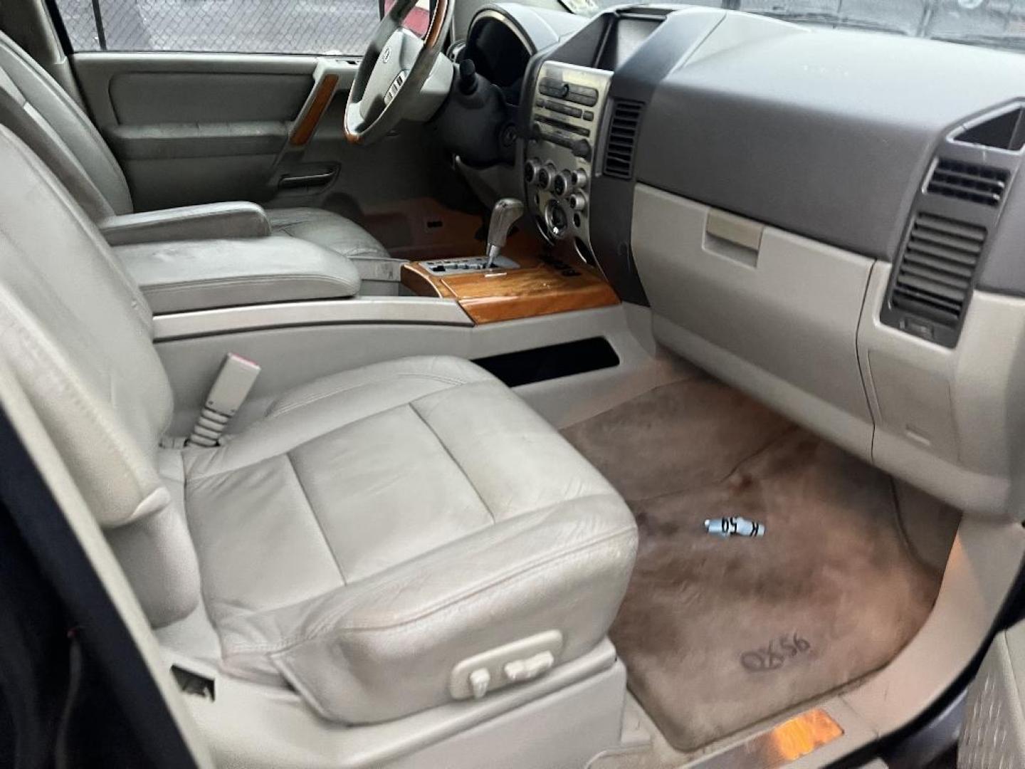 2005 BROWN INFINITI QX56 RWD (5N3AA08A65N) with an 5.6L V8 DOHC 32V engine, AUTOMATIC transmission, located at 2303 West Mt. Houston, Houston, 77038, (281) 507-3956, 29.771597, -95.339569 - Photo#6