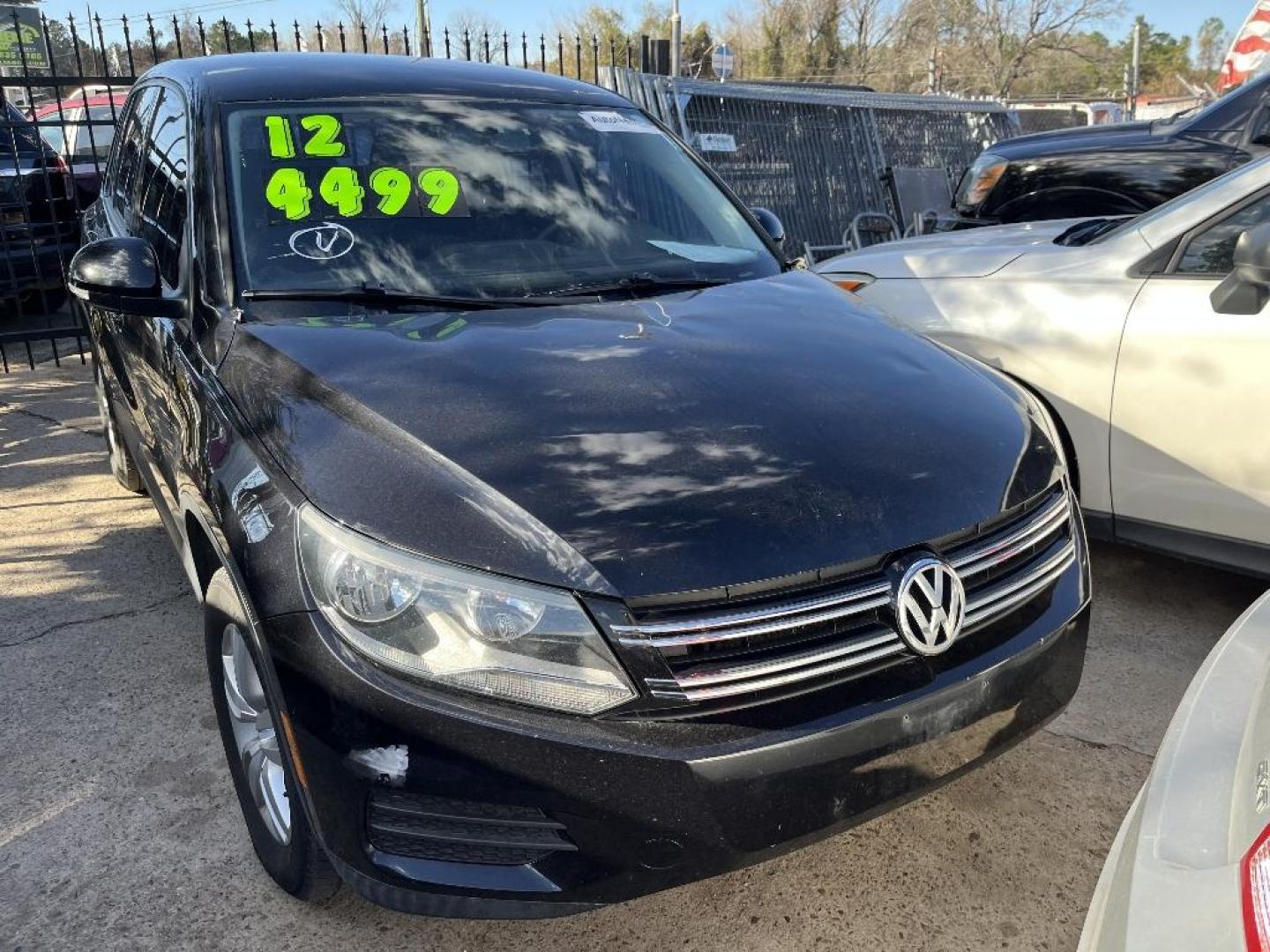 2012 BLACK VOLKSWAGEN TIGUAN S 4Motion (WVGBV7AX5CW) with an 2.0L L4 DOHC 16V TURBO engine, AUTOMATIC transmission, located at 2303 West Mt. Houston, Houston, 77038, (281) 507-3956, 29.771597, -95.339569 - Photo#0