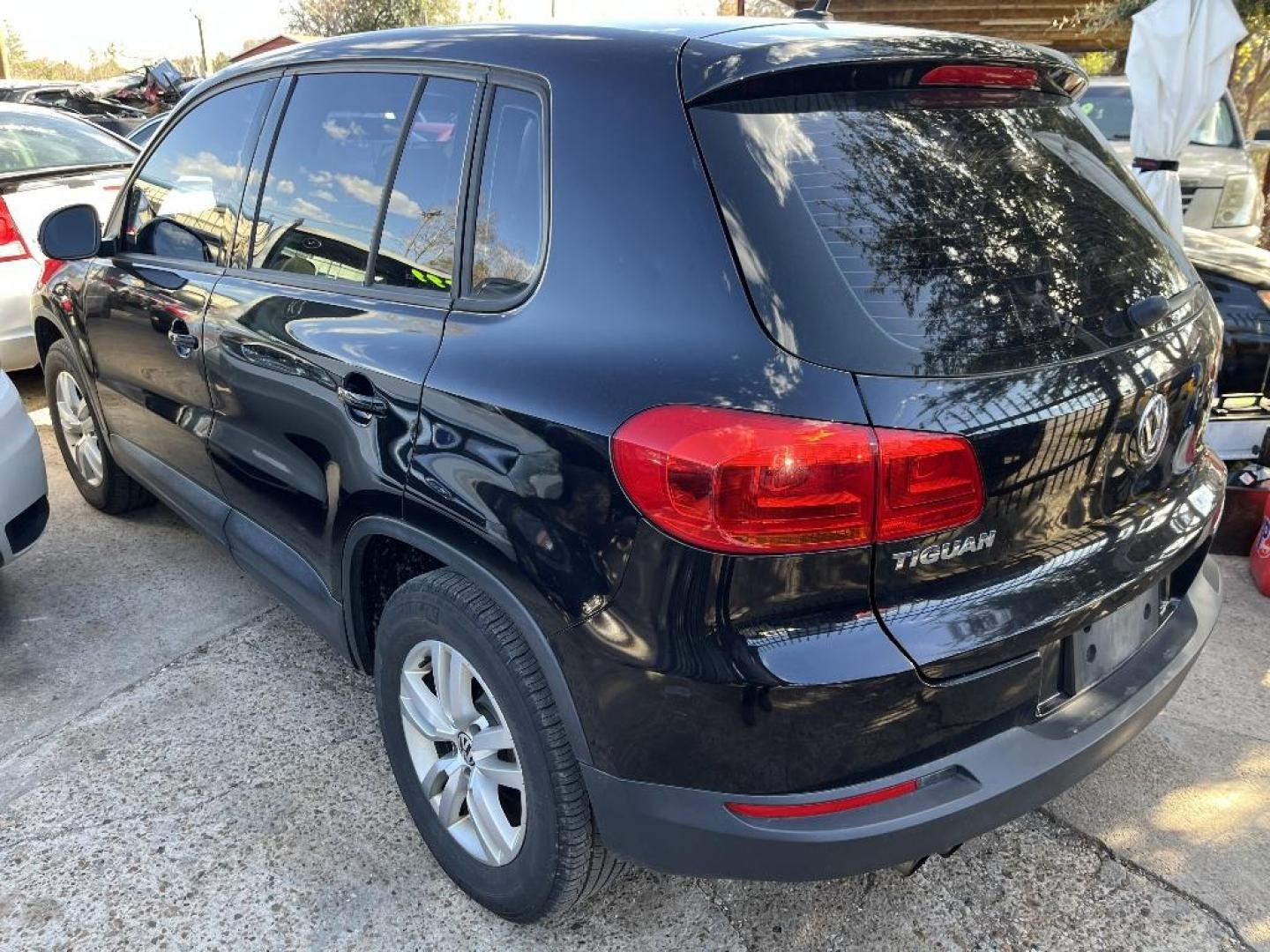 2012 BLACK VOLKSWAGEN TIGUAN S 4Motion (WVGBV7AX5CW) with an 2.0L L4 DOHC 16V TURBO engine, AUTOMATIC transmission, located at 2303 West Mt. Houston, Houston, 77038, (281) 507-3956, 29.771597, -95.339569 - Photo#2