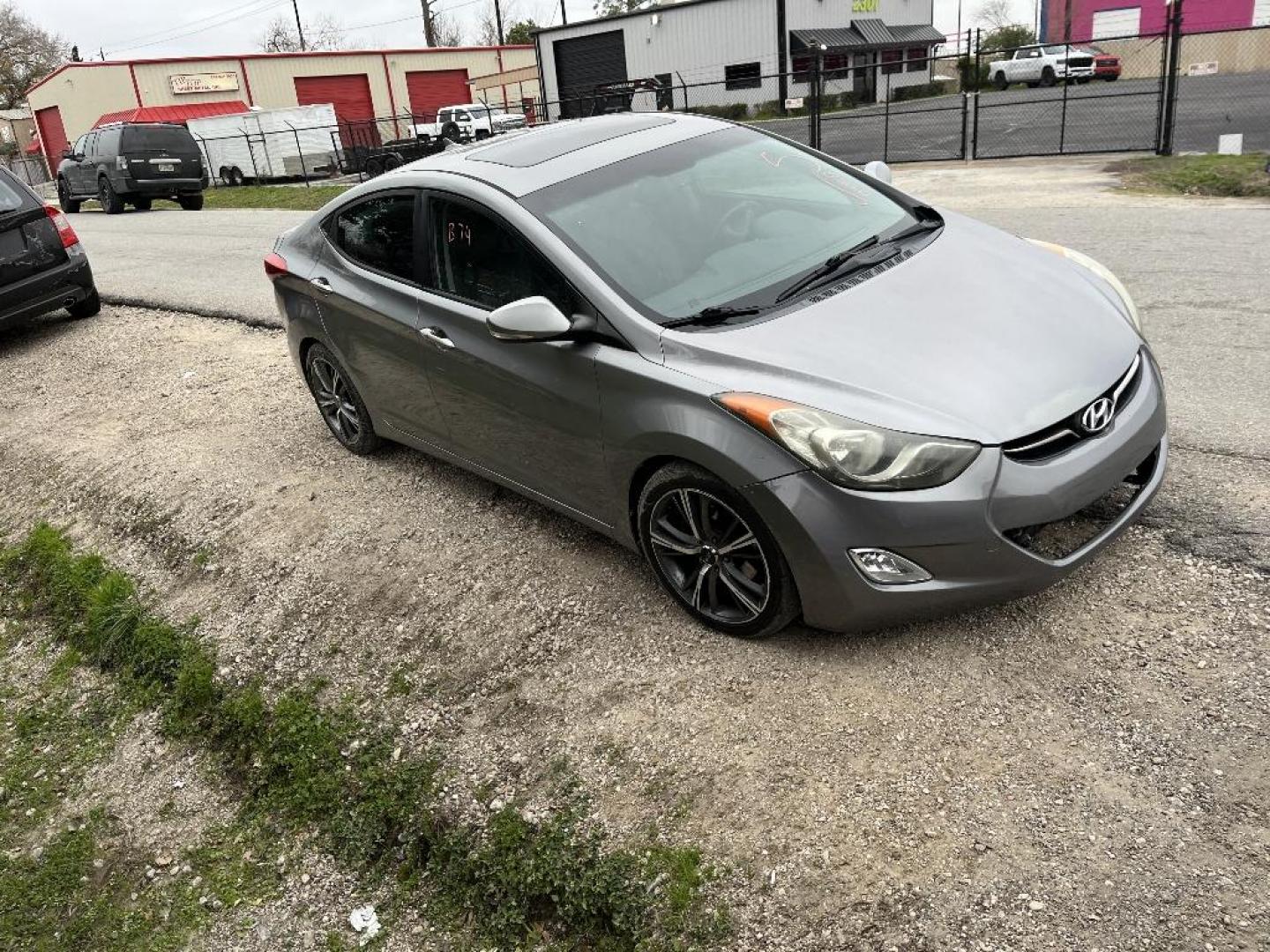 2012 BLUE HYUNDAI ELANTRA Limited (KMHDH4AE7CU) with an 1.8L L4 DOHC 16V engine, AUTOMATIC transmission, located at 2303 West Mt. Houston, Houston, 77038, (281) 507-3956, 29.771597, -95.339569 - Photo#0