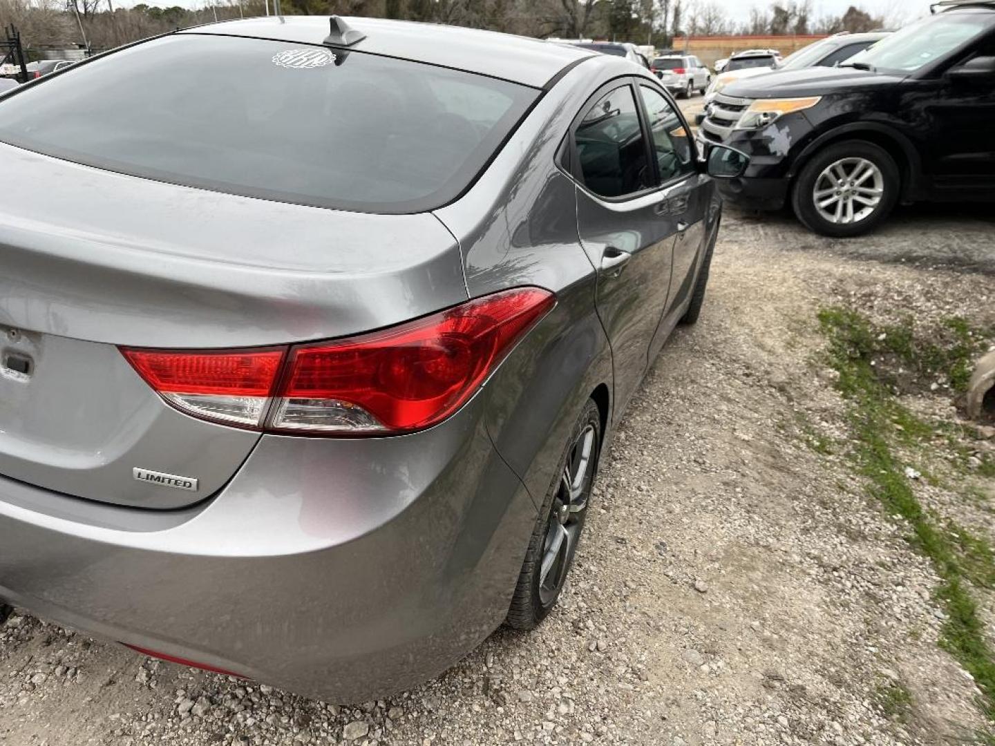 2012 BLUE HYUNDAI ELANTRA Limited (KMHDH4AE7CU) with an 1.8L L4 DOHC 16V engine, AUTOMATIC transmission, located at 2303 West Mt. Houston, Houston, 77038, (281) 507-3956, 29.771597, -95.339569 - Photo#5