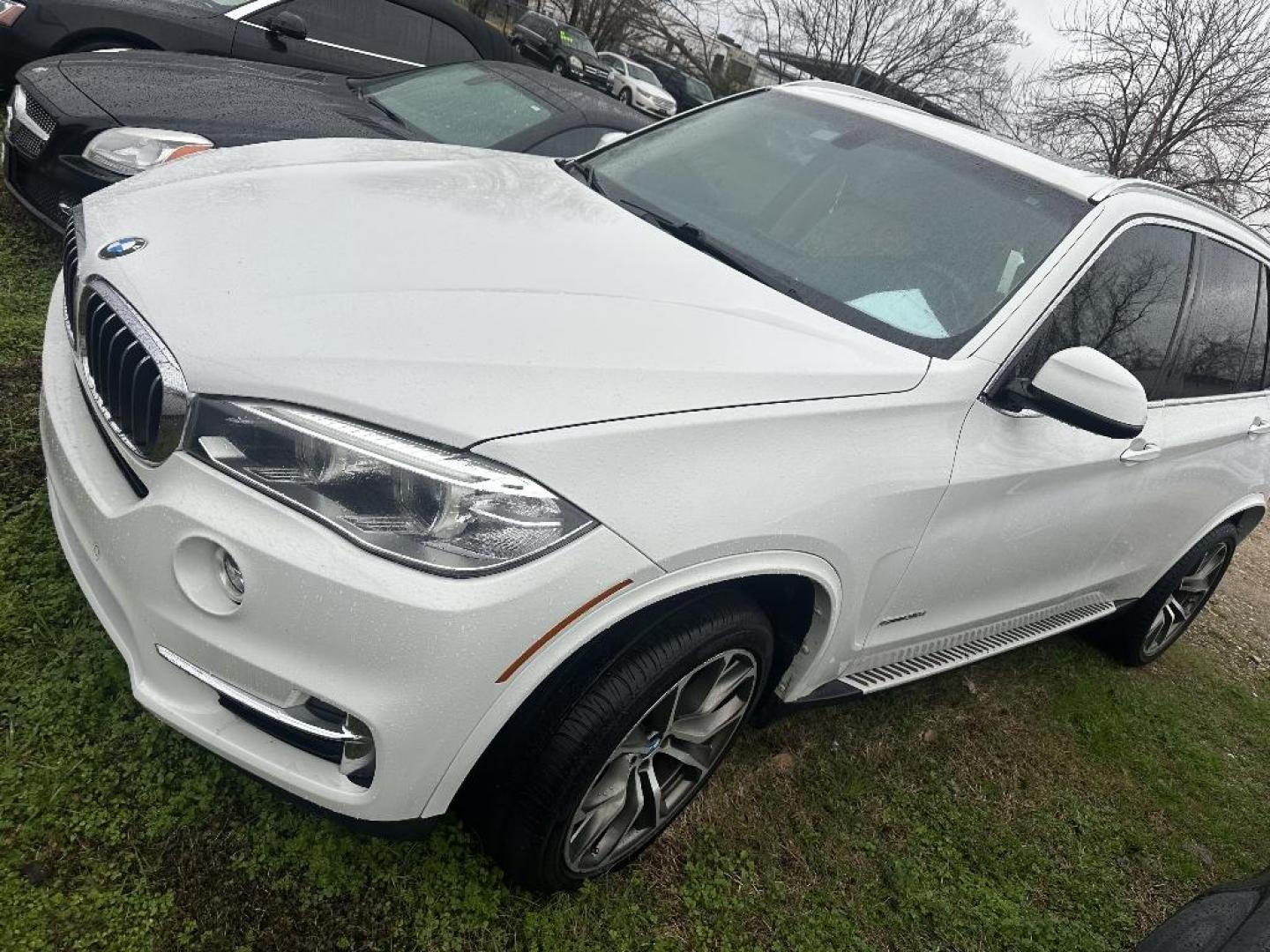 2014 BLACK BMW X5 sDrive35i (5UXKR2C59E0) with an 3.0L L6 DOHC 24V engine, AUTOMATIC transmission, located at 2303 West Mt. Houston, Houston, 77038, (281) 507-3956, 29.771597, -95.339569 - Photo#0