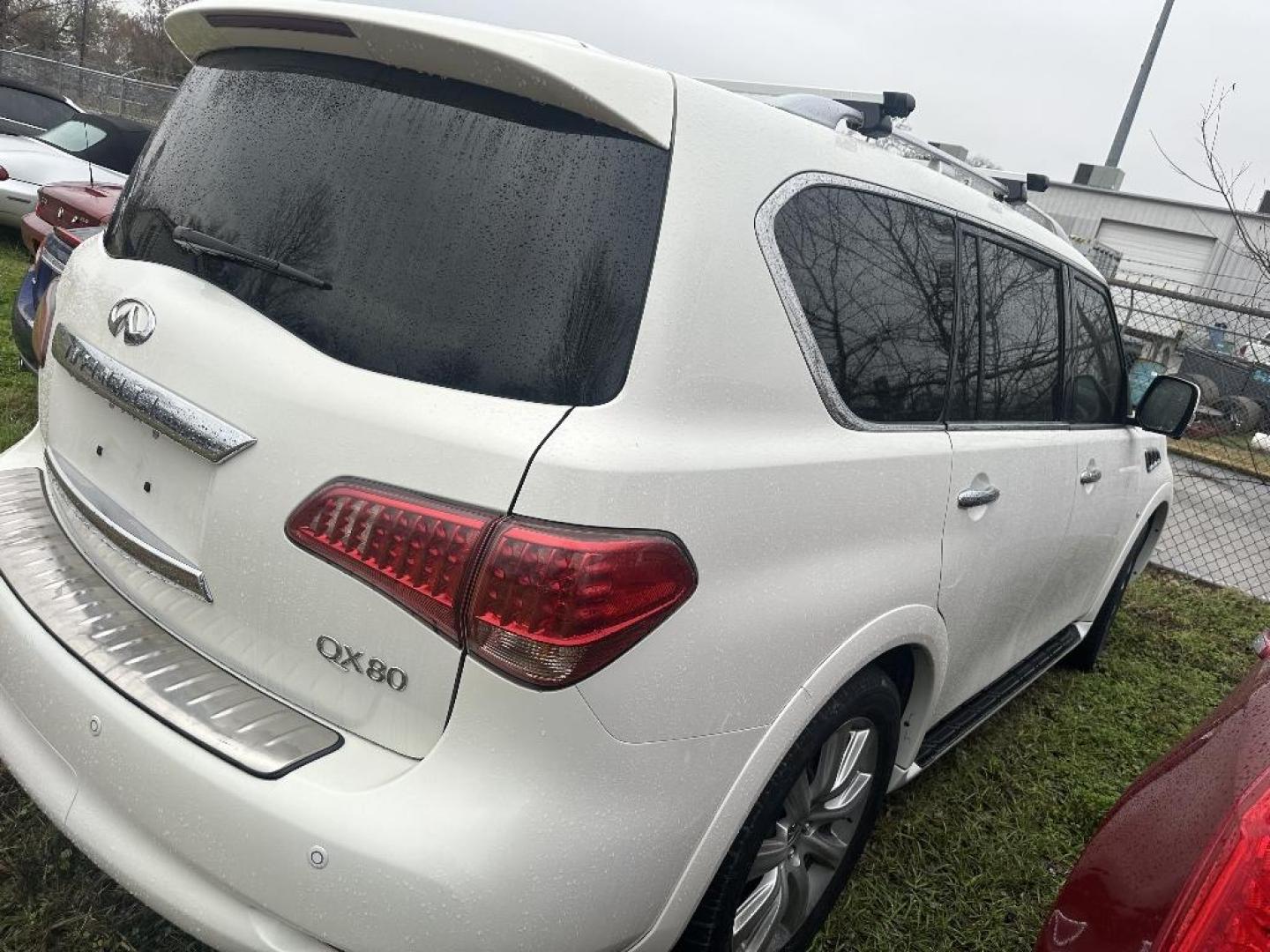 2014 BLACK INFINITI QX80 4WD (JN8AZ2NE0E9) with an 5.6L V8 DOHC 32V engine, AUTOMATIC transmission, located at 2303 West Mt. Houston, Houston, 77038, (281) 507-3956, 29.771597, -95.339569 - Photo#0