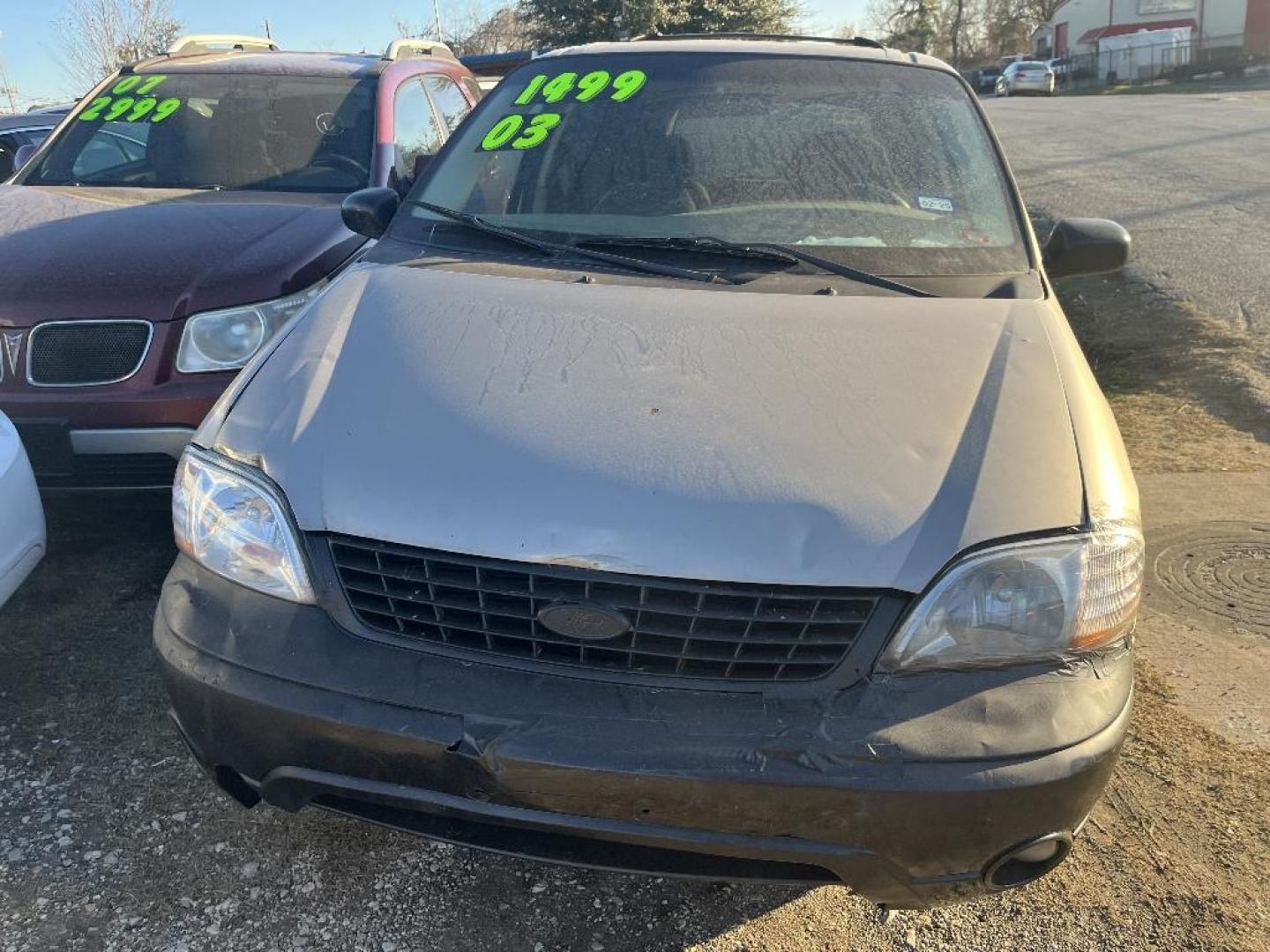 2003 BROWN FORD WINDSTAR LX (2FMZA51433B) with an 3.8L V6 OHV 12V engine, AUTOMATIC transmission, located at 2303 West Mt. Houston, Houston, 77038, (281) 507-3956, 29.771597, -95.339569 - Photo#4