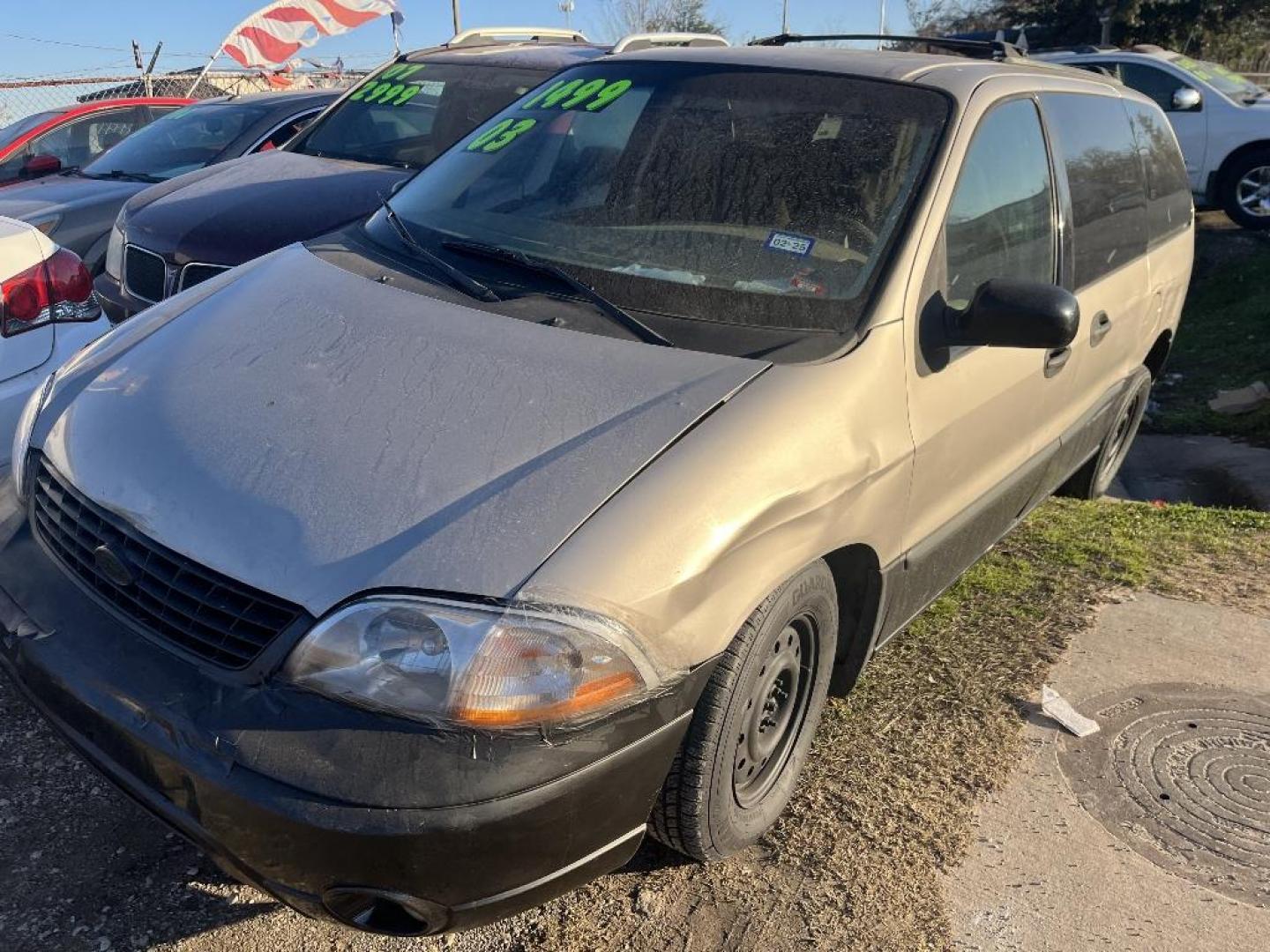 2003 BROWN FORD WINDSTAR LX (2FMZA51433B) with an 3.8L V6 OHV 12V engine, AUTOMATIC transmission, located at 2303 West Mt. Houston, Houston, 77038, (281) 507-3956, 29.771597, -95.339569 - Photo#0