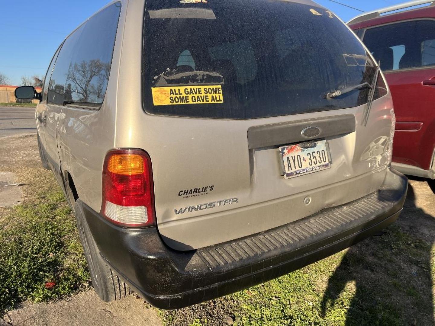 2003 BROWN FORD WINDSTAR LX (2FMZA51433B) with an 3.8L V6 OHV 12V engine, AUTOMATIC transmission, located at 2303 West Mt. Houston, Houston, 77038, (281) 507-3956, 29.771597, -95.339569 - Photo#1