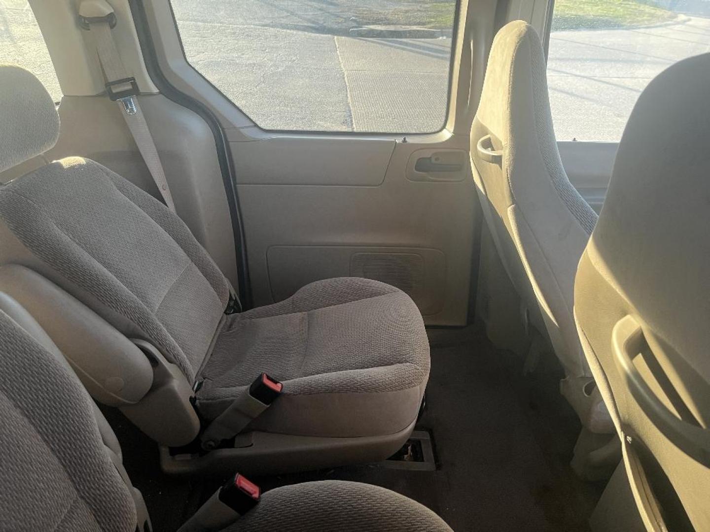 2003 BROWN FORD WINDSTAR LX (2FMZA51433B) with an 3.8L V6 OHV 12V engine, AUTOMATIC transmission, located at 2303 West Mt. Houston, Houston, 77038, (281) 507-3956, 29.771597, -95.339569 - Photo#3