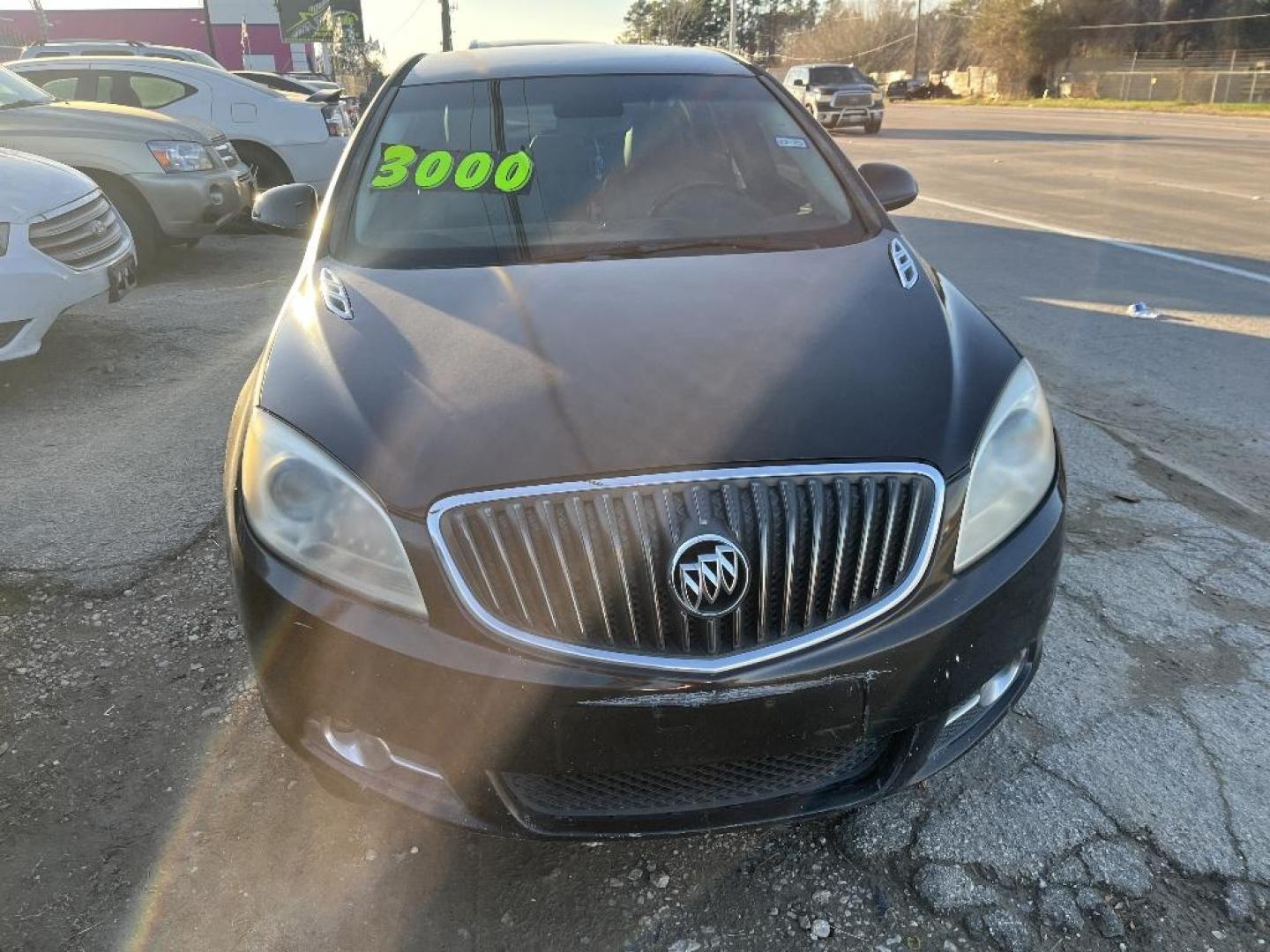 2012 BLACK BUICK VERANO Base (1G4PP5SK4C4) with an 2.4L L4 DOHC 16V FFV engine, AUTOMATIC transmission, located at 2303 West Mt. Houston, Houston, 77038, (281) 507-3956, 29.771597, -95.339569 - Photo#0