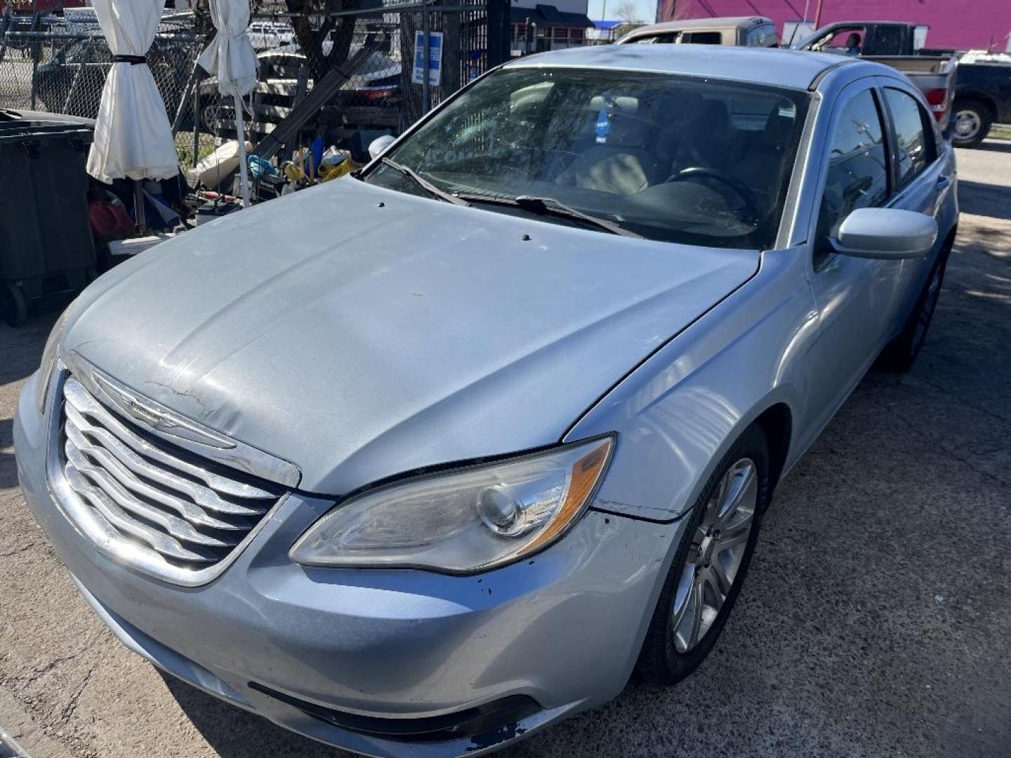 2012 GRAY CHRYSLER 200 Touring (1C3CCBBB8CN) with an 2.4L L4 DOHC 16V engine, AUTOMATIC transmission, located at 2303 West Mt. Houston, Houston, 77038, (281) 507-3956, 29.771597, -95.339569 - Photo#0