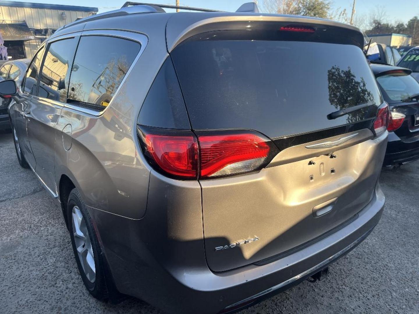 2017 BROWN CHRYSLER PACIFICA Touring-L Plus (2C4RC1EG2HR) with an 3.6L V6 DOHC 24V engine, AUTOMATIC transmission, located at 2303 West Mt. Houston, Houston, 77038, (281) 507-3956, 29.771597, -95.339569 - Photo#1