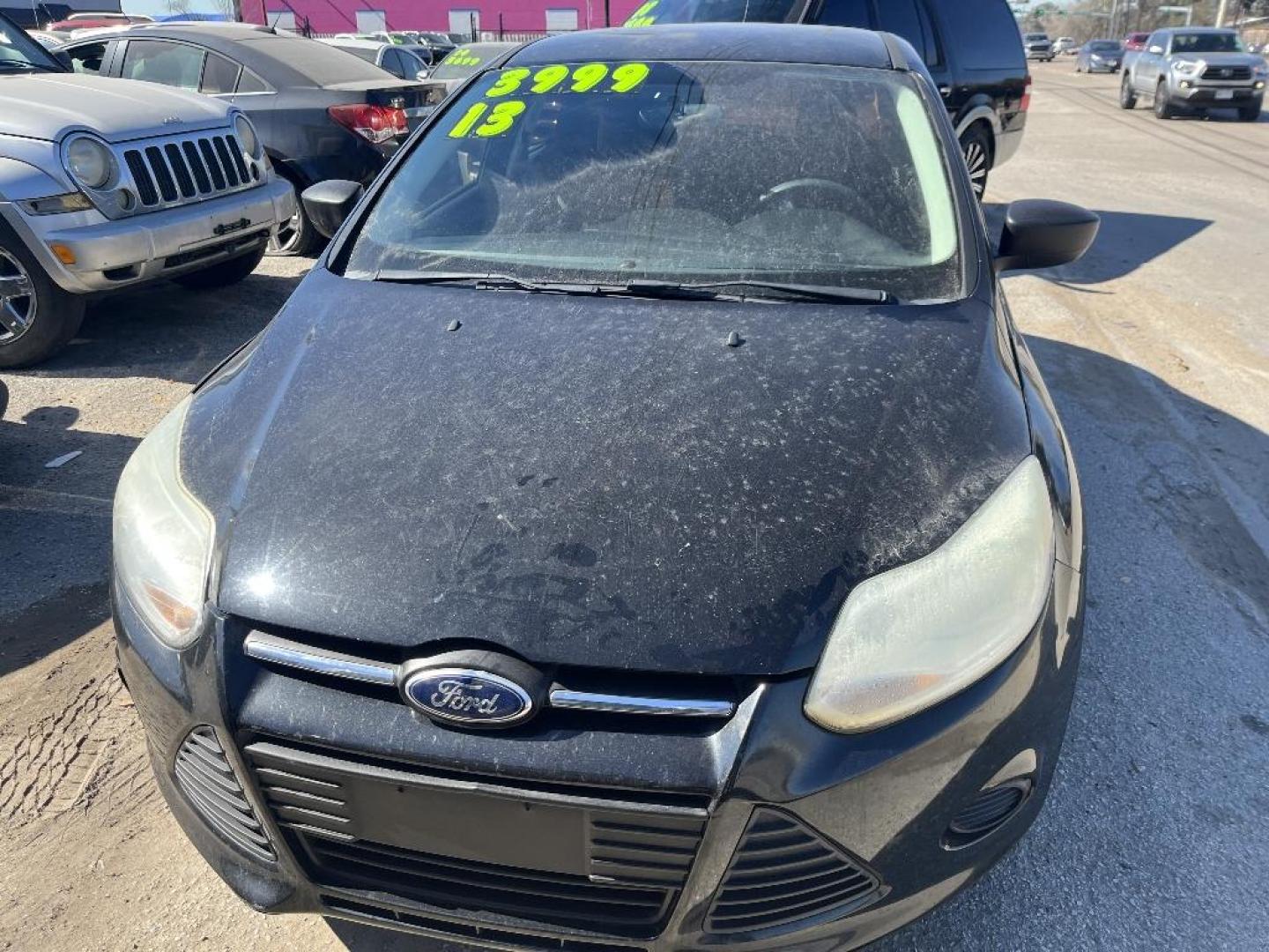 2013 BLACK FORD FOCUS S Sedan (1FADP3E29DL) with an 2.0L L4 DOHC 16V engine, AUTOMATIC transmission, located at 2303 West Mt. Houston, Houston, 77038, (281) 507-3956, 29.771597, -95.339569 - Photo#0