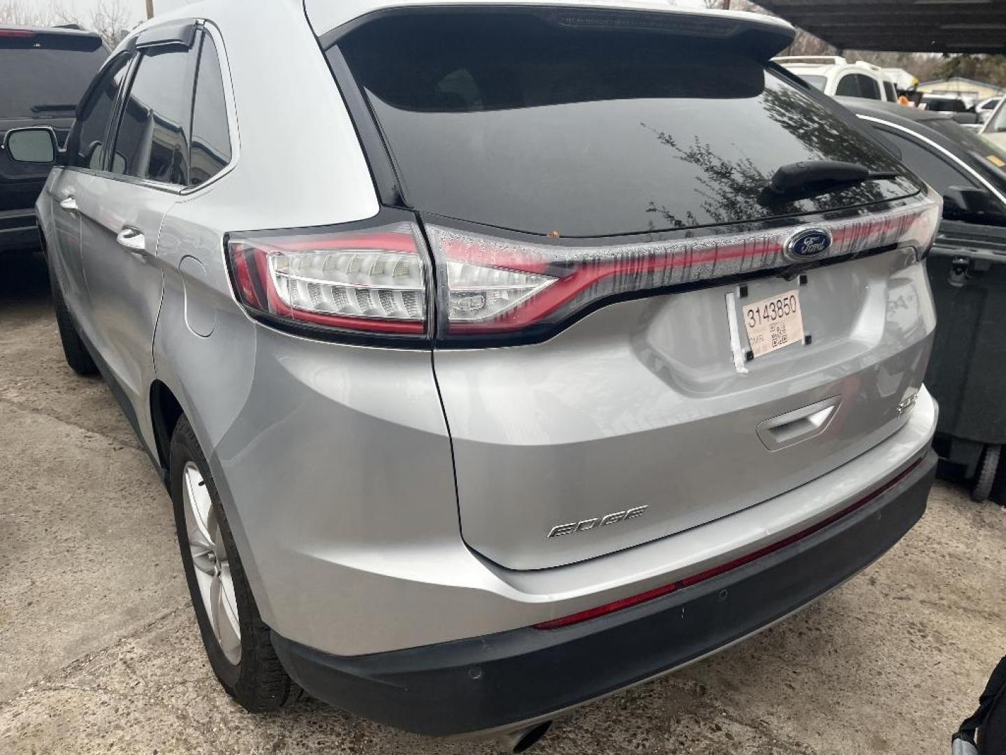 2015 GRAY FORD EDGE SEL FWD (2FMTK3J97FB) with an 2.0L L4 DOHC 16V engine, AUTOMATIC transmission, located at 2303 West Mt. Houston, Houston, 77038, (281) 507-3956, 29.771597, -95.339569 - Photo#1