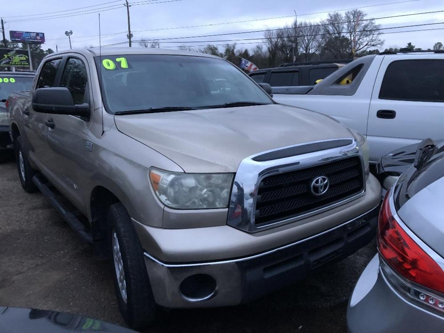 2007 BROWN TOYOTA TUNDRA SR5 CrewMax 2WD (5TBET54117S) with an 5.7L V8 DOHC 32V engine, AUTOMATIC transmission, located at 2303 West Mt. Houston, Houston, 77038, (281) 507-3956, 29.771597, -95.339569 - Photo#0