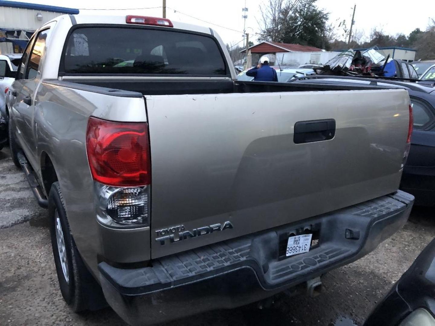 2007 BROWN TOYOTA TUNDRA SR5 CrewMax 2WD (5TBET54117S) with an 5.7L V8 DOHC 32V engine, AUTOMATIC transmission, located at 2303 West Mt. Houston, Houston, 77038, (281) 507-3956, 29.771597, -95.339569 - Photo#1