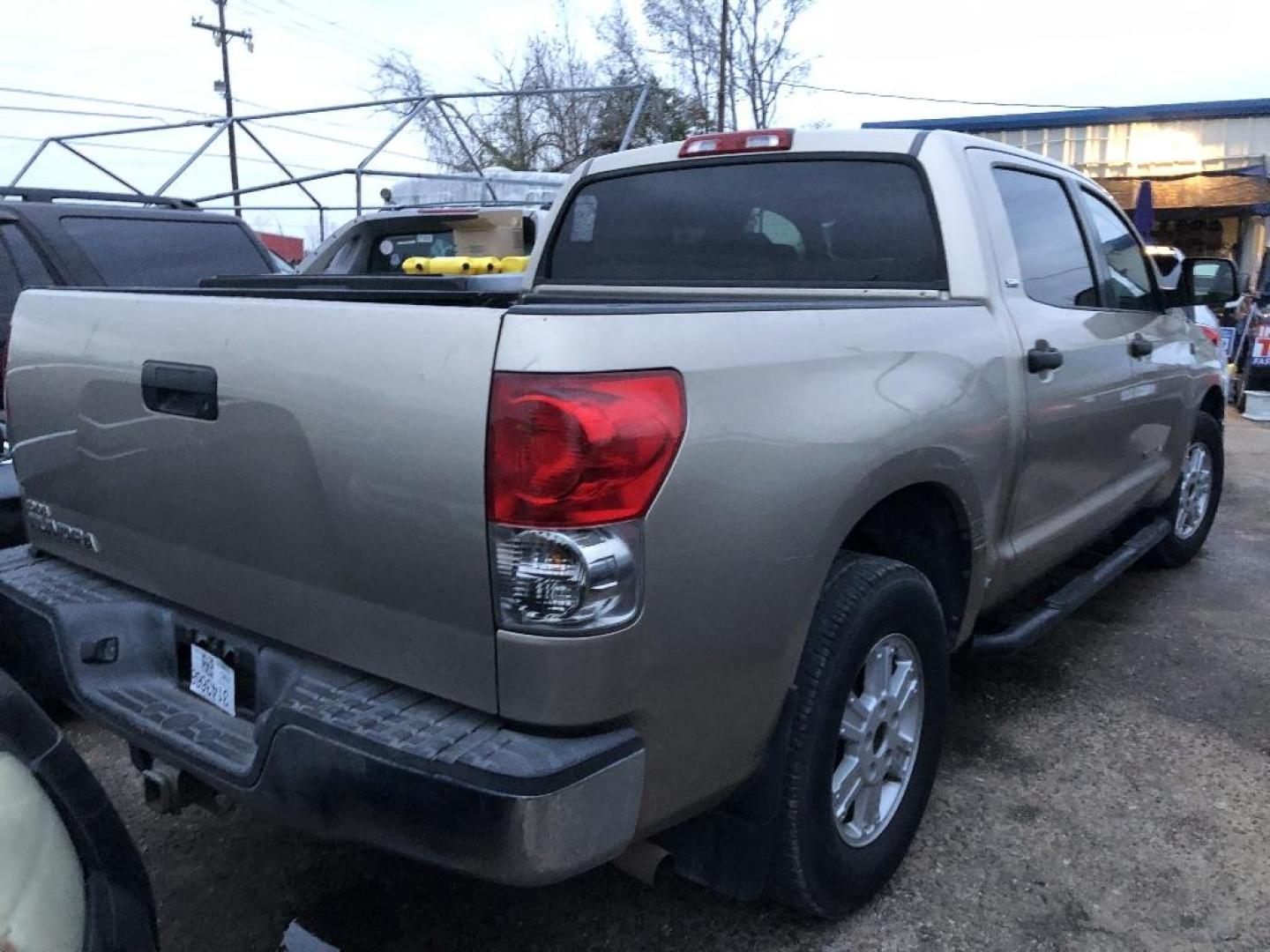 2007 BROWN TOYOTA TUNDRA SR5 CrewMax 2WD (5TBET54117S) with an 5.7L V8 DOHC 32V engine, AUTOMATIC transmission, located at 2303 West Mt. Houston, Houston, 77038, (281) 507-3956, 29.771597, -95.339569 - Photo#6