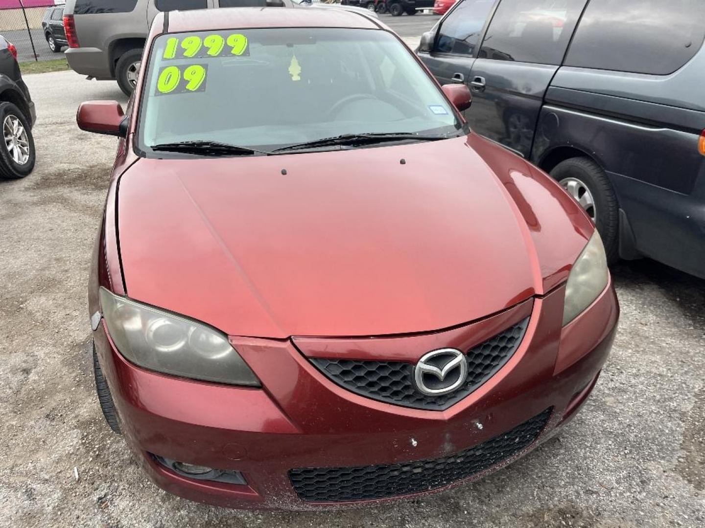 2009 RED MAZDA MAZDA3 i Sport 4-Door (JM1BK32F391) with an 2.0L L4 DOHC 16V engine, AUTOMATIC transmission, located at 2303 West Mt. Houston, Houston, 77038, (281) 507-3956, 29.771597, -95.339569 - Photo#0