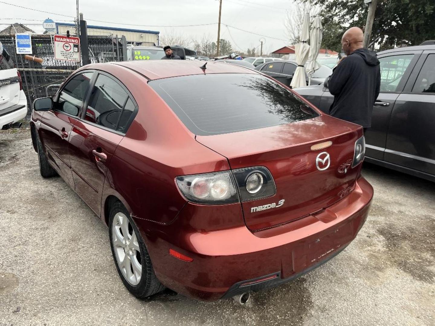 2009 RED MAZDA MAZDA3 i Sport 4-Door (JM1BK32F391) with an 2.0L L4 DOHC 16V engine, AUTOMATIC transmission, located at 2303 West Mt. Houston, Houston, 77038, (281) 507-3956, 29.771597, -95.339569 - Photo#1