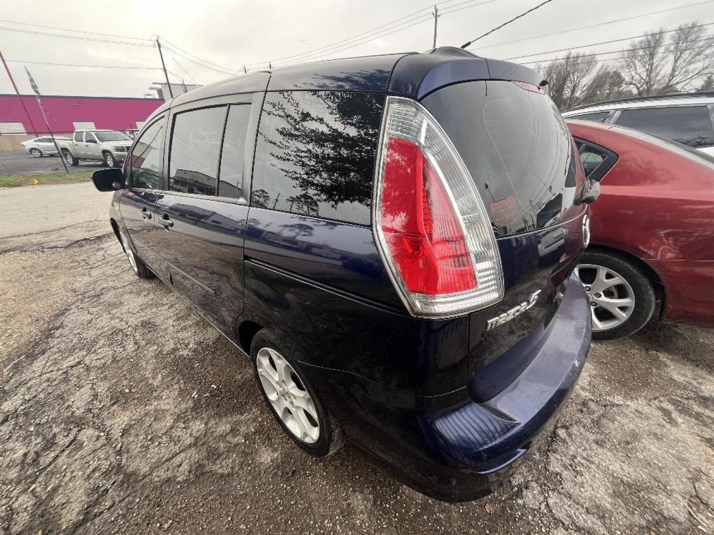 2009 BLUE MAZDA MAZDA5 Grand Touring (JM1CR293890) with an 2.3L L4 DOHC 16V engine, AUTOMATIC transmission, located at 2303 West Mt. Houston, Houston, 77038, (281) 507-3956, 29.771597, -95.339569 - Photo#5