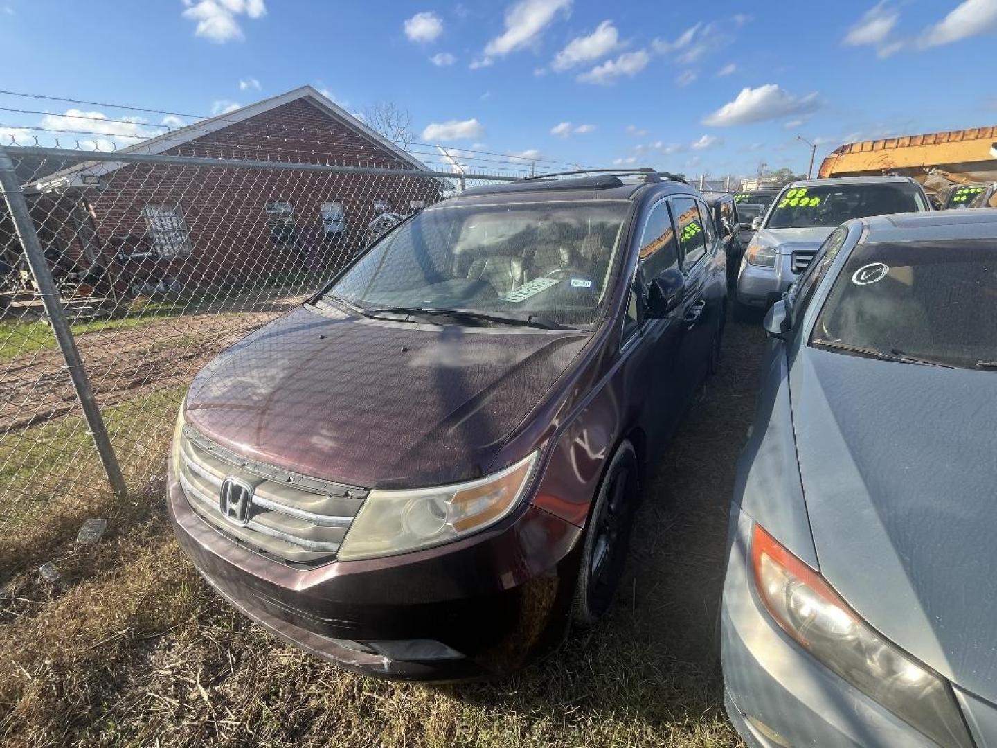 2012 MAROON HONDA ODYSSEY Touring (5FNRL5H92CB) with an 3.5L V6 SOHC 24V engine, AUTOMATIC transmission, located at 2303 West Mt. Houston, Houston, 77038, (281) 507-3956, 29.771597, -95.339569 - Photo#0