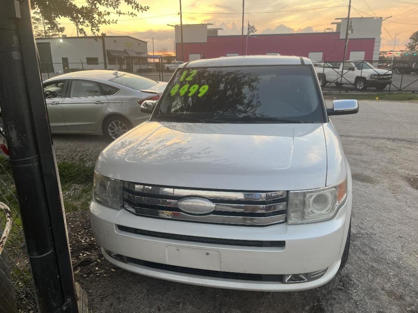 2012 WHITE FORD FLEX Limited FWD (2FMGK5DC7CB) with an 3.5L V6 DOHC 24V engine, AUTOMATIC transmission, located at 2303 West Mt. Houston, Houston, 77038, (281) 507-3956, 29.771597, -95.339569 - Photo#0