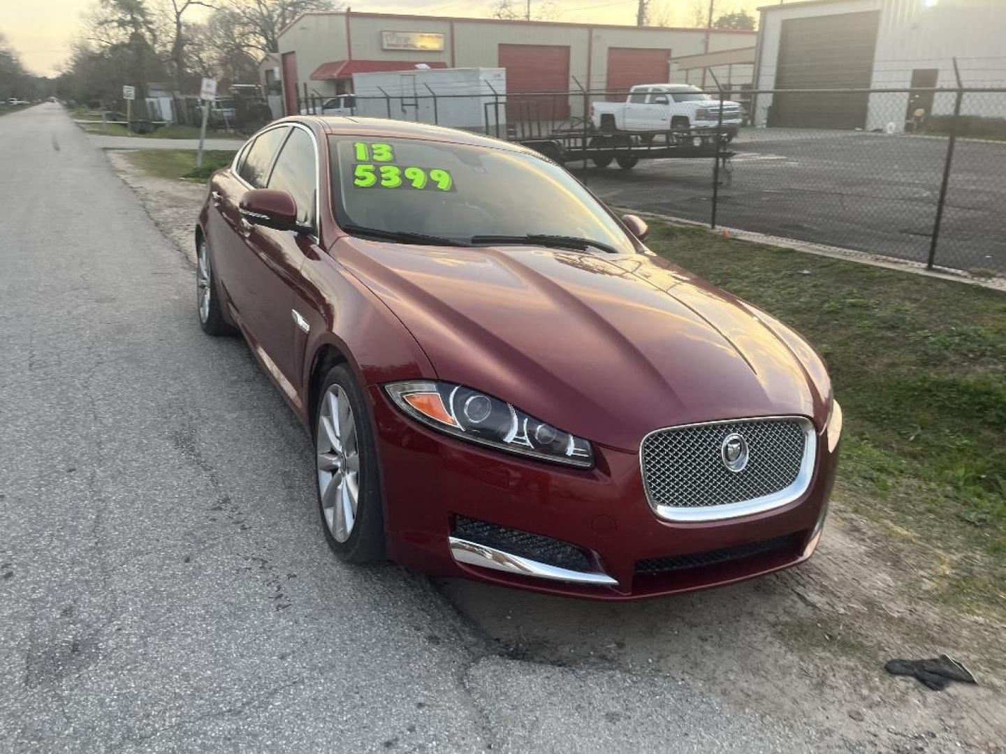 2013 RED JAGUAR XF-SERIES XF 3.0L V6 SC AWD (SAJWJ0EFXD8) with an 3.0L V6 DOHC 24V engine, AUTOMATIC transmission, located at 2303 West Mt. Houston, Houston, 77038, (281) 507-3956, 29.771597, -95.339569 - Photo#0