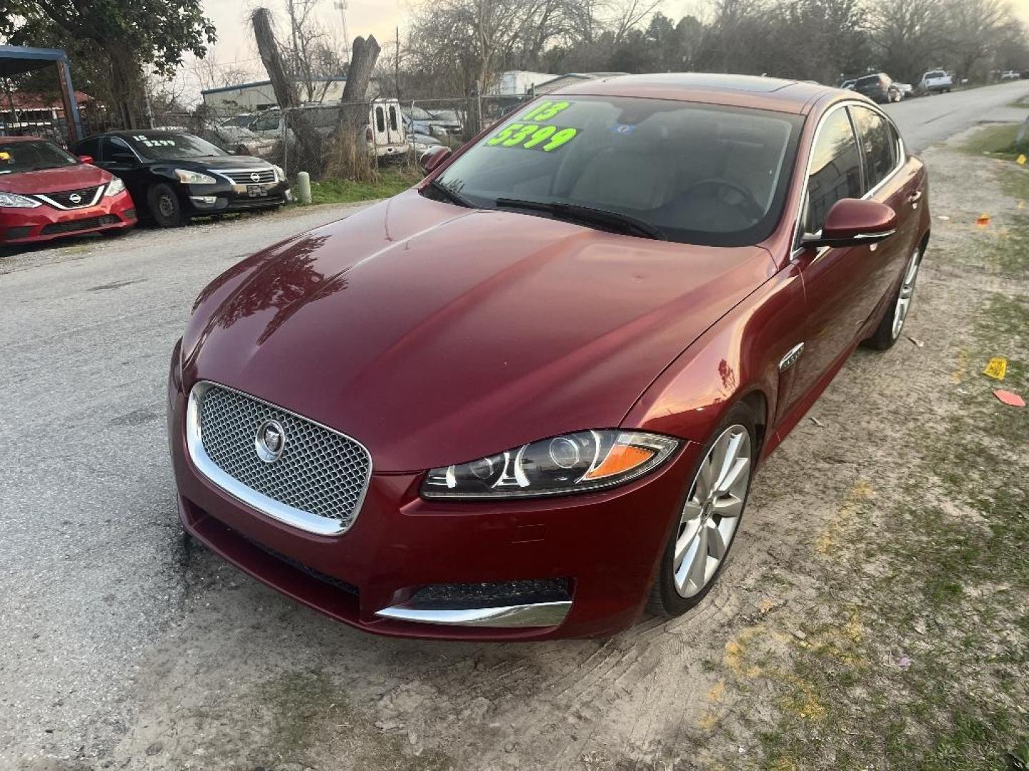 2013 RED JAGUAR XF-SERIES XF 3.0L V6 SC AWD (SAJWJ0EFXD8) with an 3.0L V6 DOHC 24V engine, AUTOMATIC transmission, located at 2303 West Mt. Houston, Houston, 77038, (281) 507-3956, 29.771597, -95.339569 - Photo#1