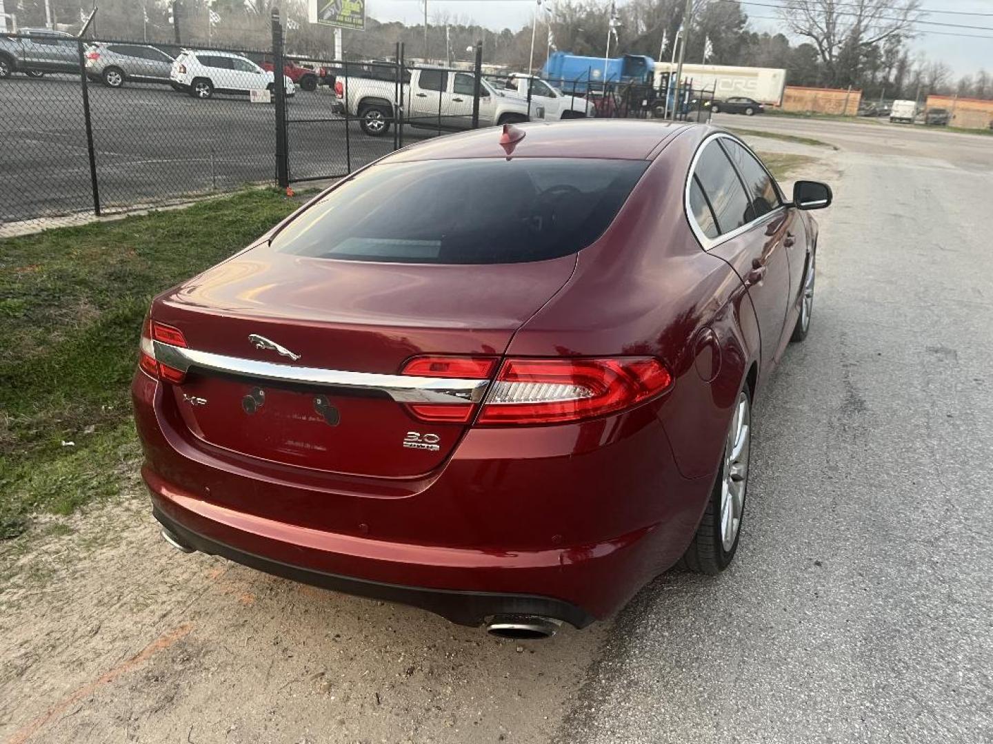 2013 RED JAGUAR XF-SERIES XF 3.0L V6 SC AWD (SAJWJ0EFXD8) with an 3.0L V6 DOHC 24V engine, AUTOMATIC transmission, located at 2303 West Mt. Houston, Houston, 77038, (281) 507-3956, 29.771597, -95.339569 - Photo#2