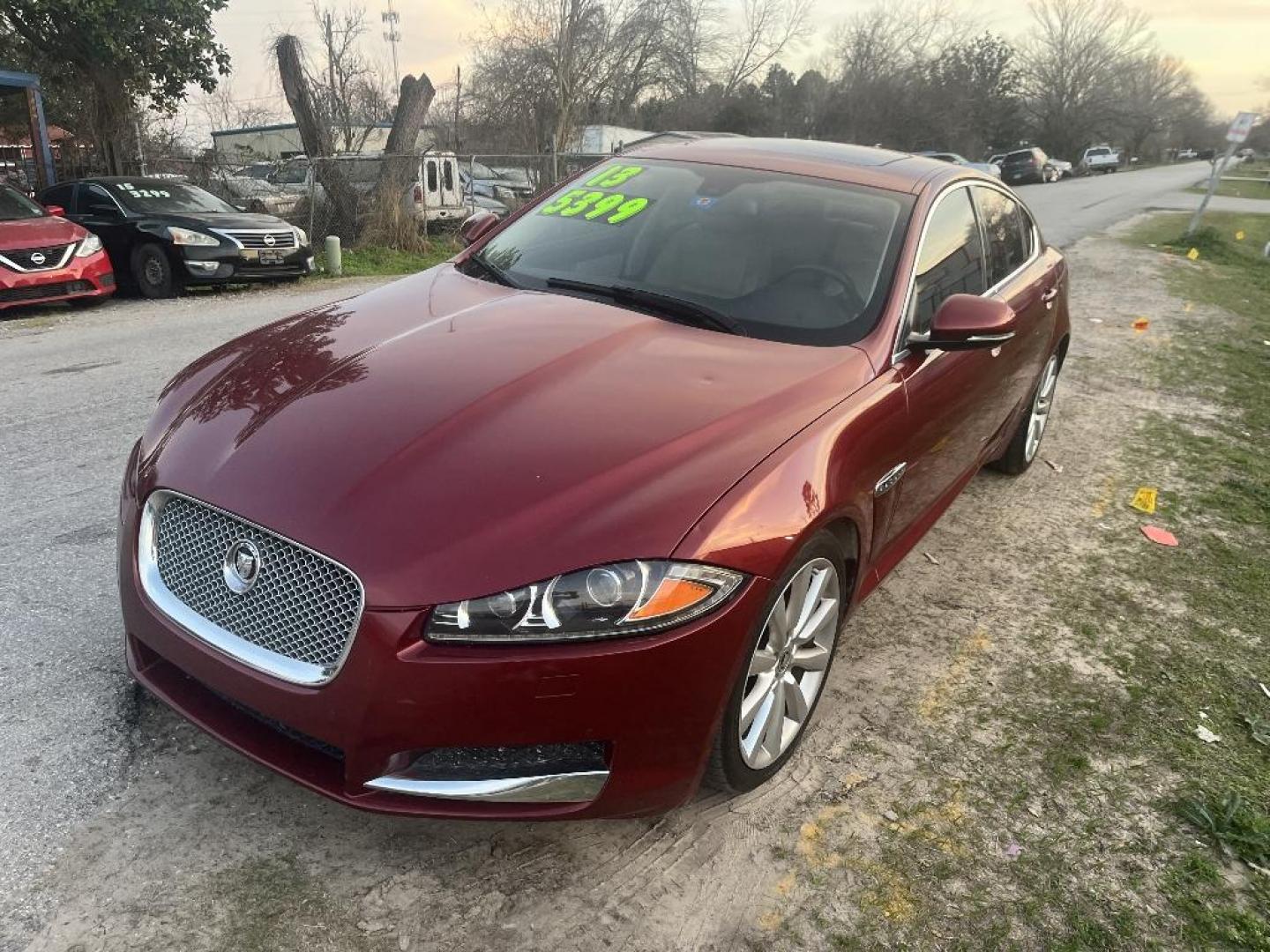 2013 RED JAGUAR XF-SERIES XF 3.0L V6 SC AWD (SAJWJ0EFXD8) with an 3.0L V6 DOHC 24V engine, AUTOMATIC transmission, located at 2303 West Mt. Houston, Houston, 77038, (281) 507-3956, 29.771597, -95.339569 - Photo#5