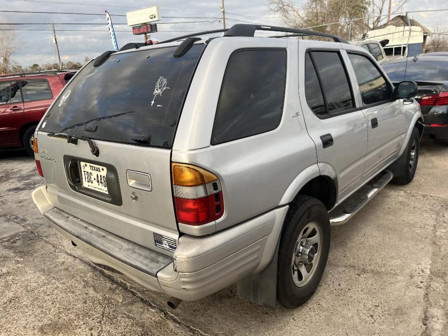 1999 SILVER ISUZU RODEO S V6 2WD (4S2CK58W6X4) with an 3.2L V6 DOHC 24V engine, AUTOMATIC transmission, located at 2303 West Mt. Houston, Houston, 77038, (281) 507-3956, 29.771597, -95.339569 - Photo#1