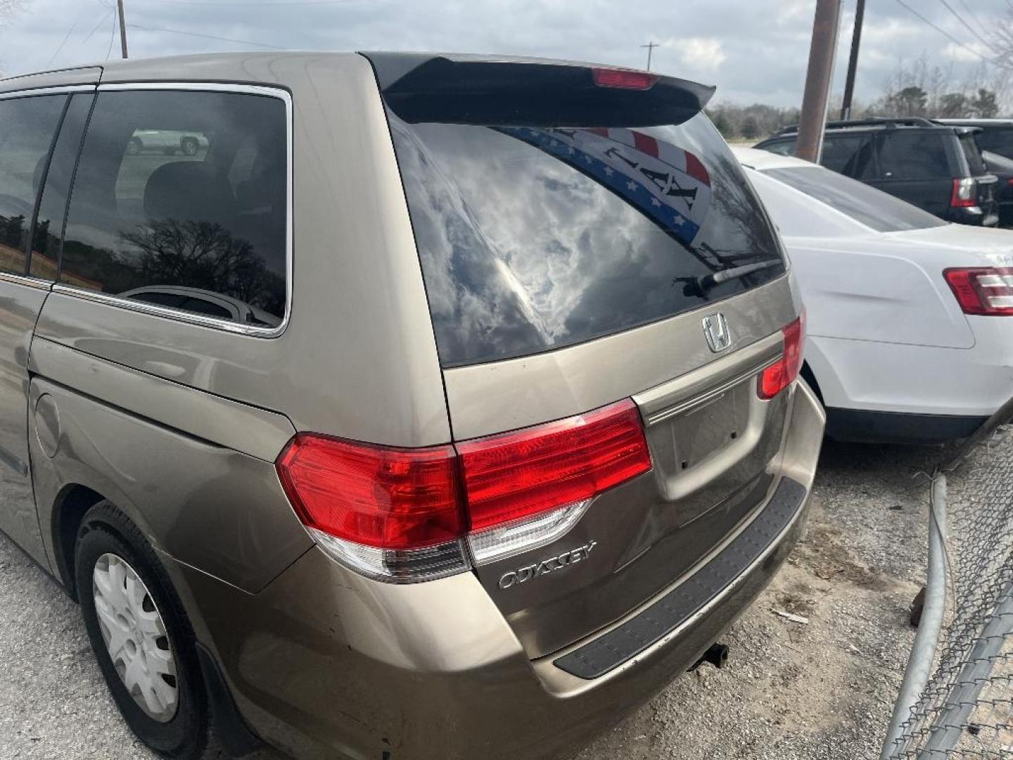 2010 BROWN HONDA ODYSSEY LX (5FNRL3H27AB) with an 3.5L V6 SOHC 24V engine, AUTOMATIC transmission, located at 2303 West Mt. Houston, Houston, 77038, (281) 507-3956, 29.771597, -95.339569 - Photo#1