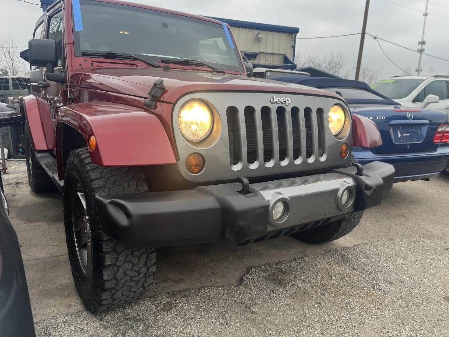 2012 MAROON JEEP WRANGLER Sport 4WD (1C4AJWAG4CL) with an 3.6L V6 DOHC 24V FFV engine, AUTOMATIC transmission, located at 2303 West Mt. Houston, Houston, 77038, (281) 507-3956, 29.771597, -95.339569 - Photo#0