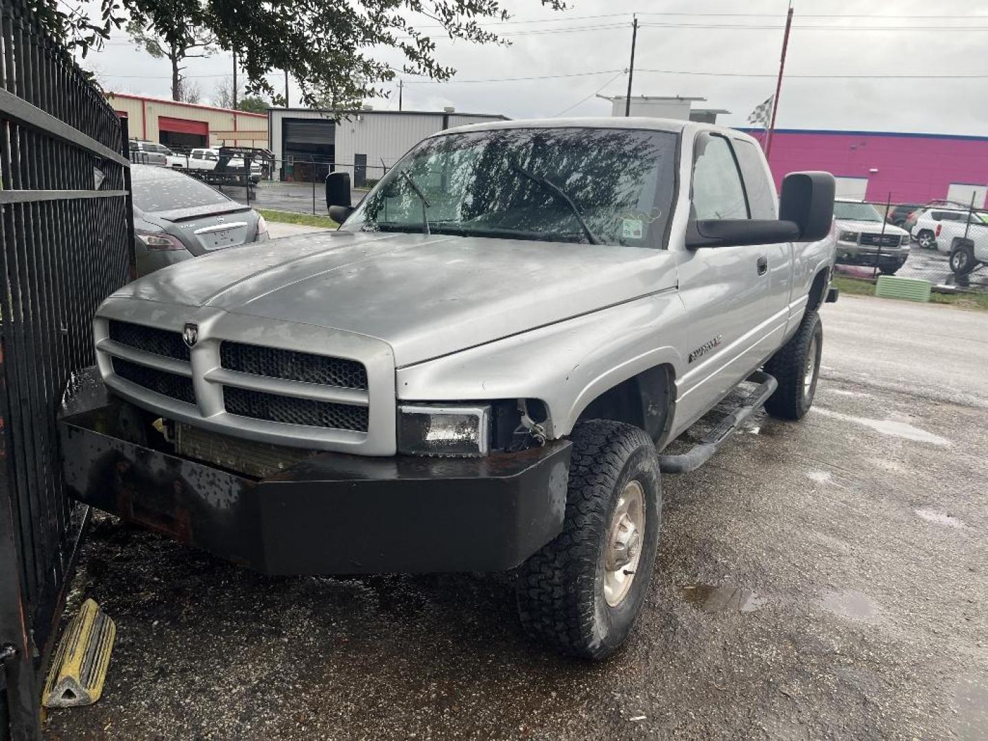 2001 GRAY DODGE RAM 2500 Quad Cab Short Bed 4WD (1B7KF23W51J) with an 8.0L V10 OHV 20V engine, MANUAL transmission, located at 2303 West Mt. Houston, Houston, 77038, (281) 507-3956, 29.771597, -95.339569 - Photo#0