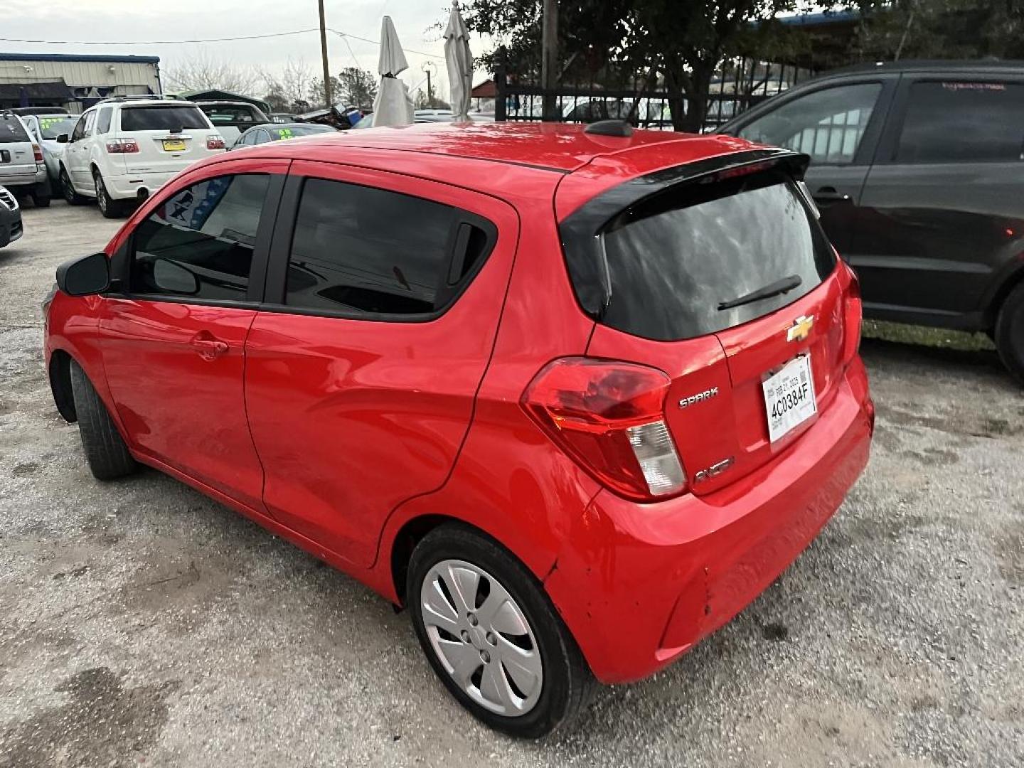 2016 RED CHEVROLET SPARK LS CVT (KL8CB6SA7GC) with an 1.4L L4 16V DOHC engine, AUTOMATIC transmission, located at 2303 West Mt. Houston, Houston, 77038, (281) 507-3956, 29.771597, -95.339569 - Photo#1