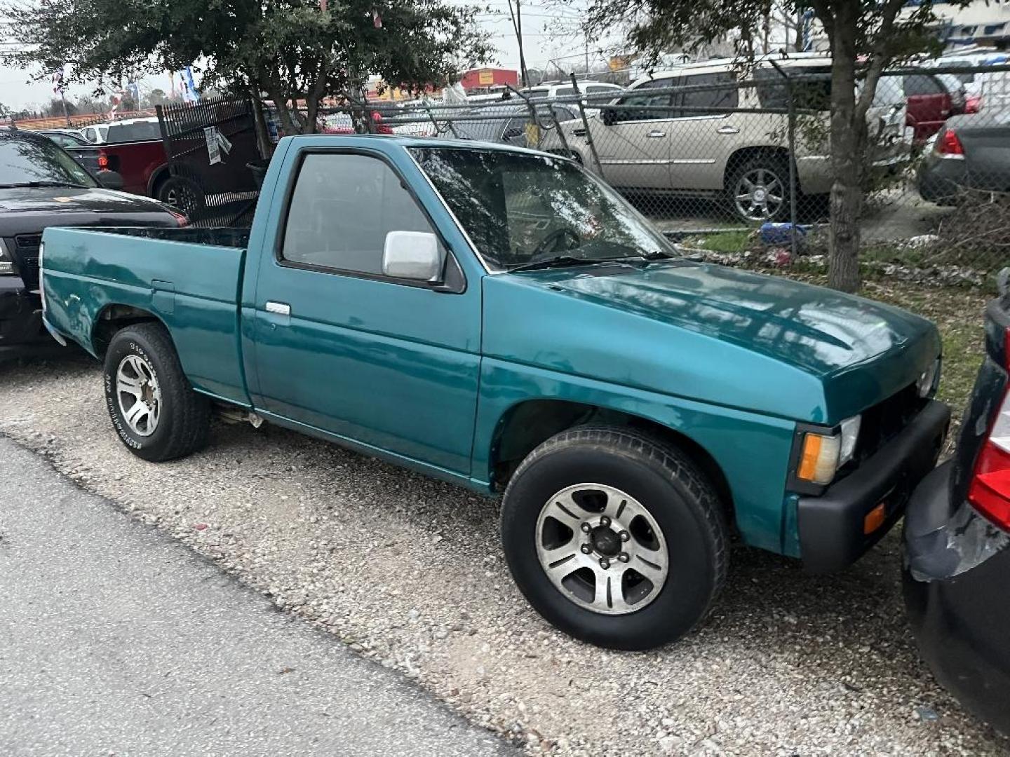 1996 GREEN NISSAN PICKUP Reg. Cab 2WD (1N6SD11S4TC) with an 2.4L L4 SOHC 12V engine, AUTOMATIC transmission, located at 2303 West Mt. Houston, Houston, 77038, (281) 507-3956, 29.771597, -95.339569 - Photo#0