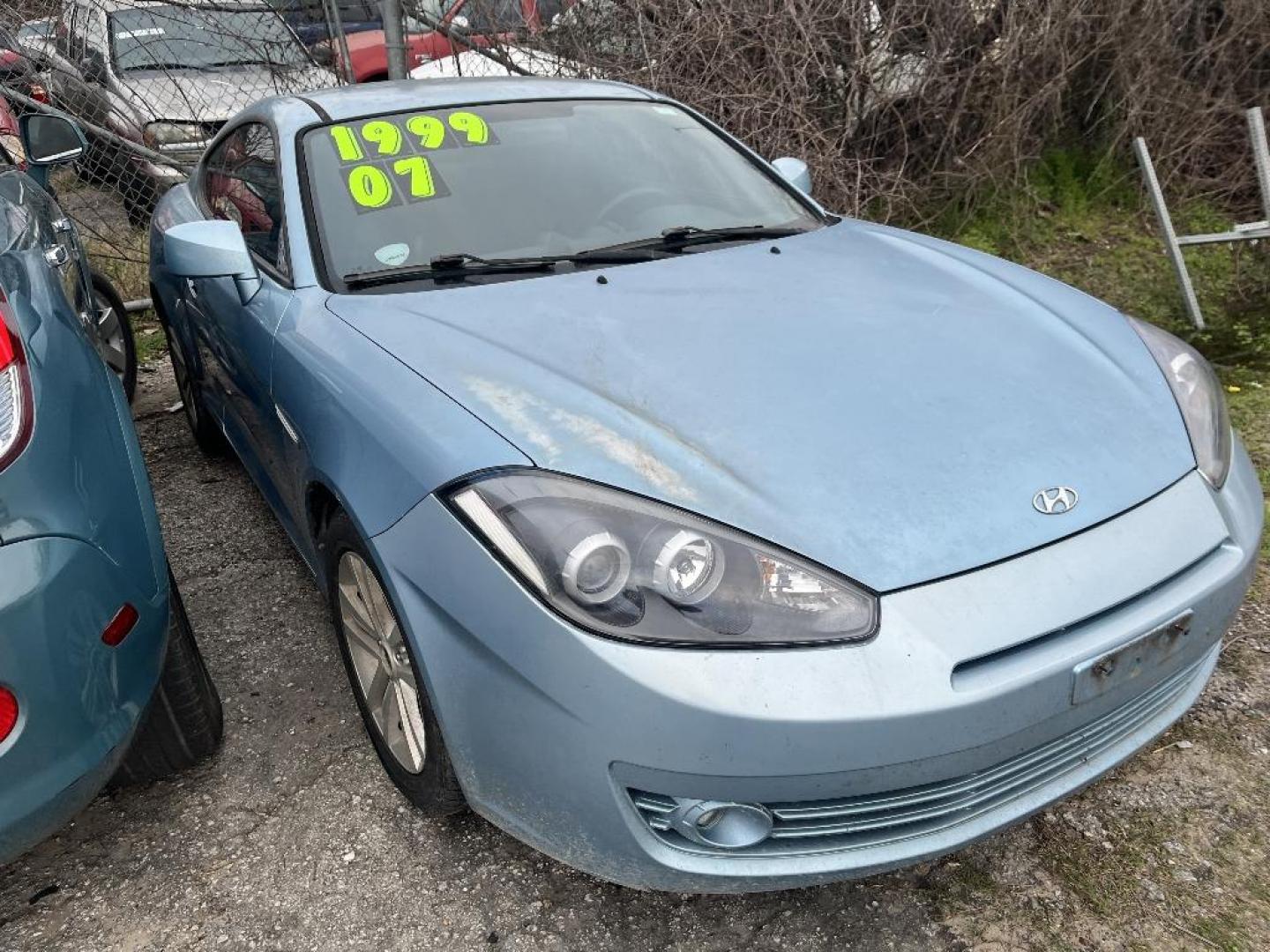 2007 BLUE HYUNDAI TIBURON GS (KMHHM66D47U) with an 2.0L L4 DOHC 16V engine, MANUAL transmission, located at 2303 West Mt. Houston, Houston, 77038, (281) 507-3956, 29.771597, -95.339569 - Photo#0