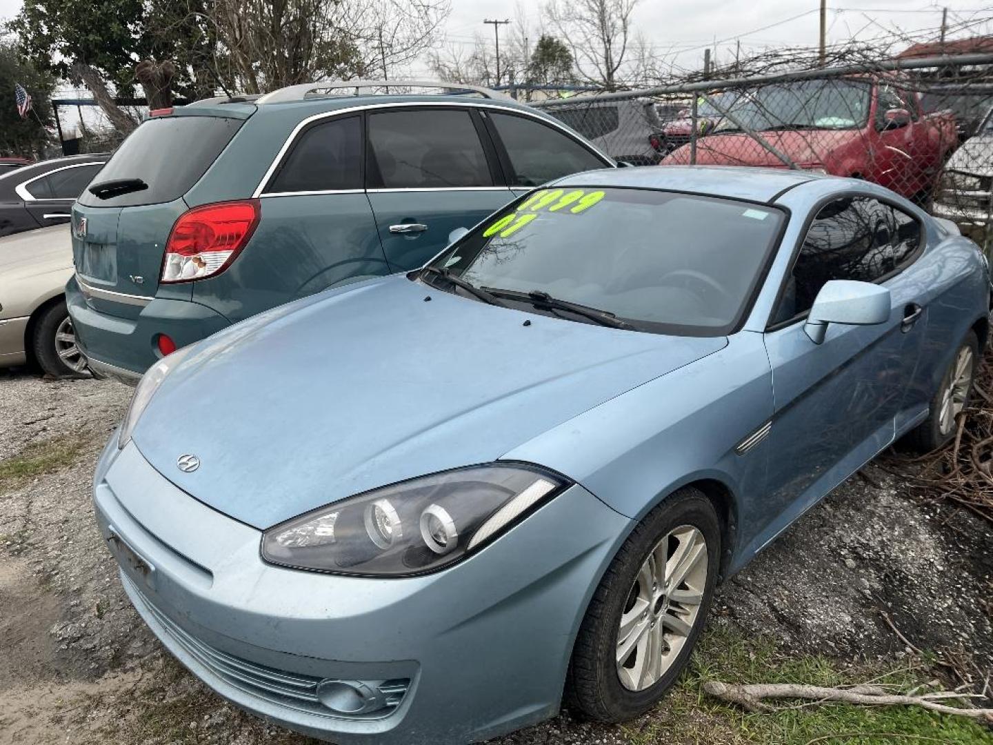 2007 BLUE HYUNDAI TIBURON GS (KMHHM66D47U) with an 2.0L L4 DOHC 16V engine, MANUAL transmission, located at 2303 West Mt. Houston, Houston, 77038, (281) 507-3956, 29.771597, -95.339569 - Photo#4