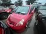 2007 RED HONDA FIT Sport 5-Speed AT (JHMGD38667S) with an 1.5L L4 SOHC 16V engine, AUTOMATIC transmission, located at 2303 West Mt. Houston, Houston, 77038, (281) 507-3956, 29.771597, -95.339569 - Photo#0