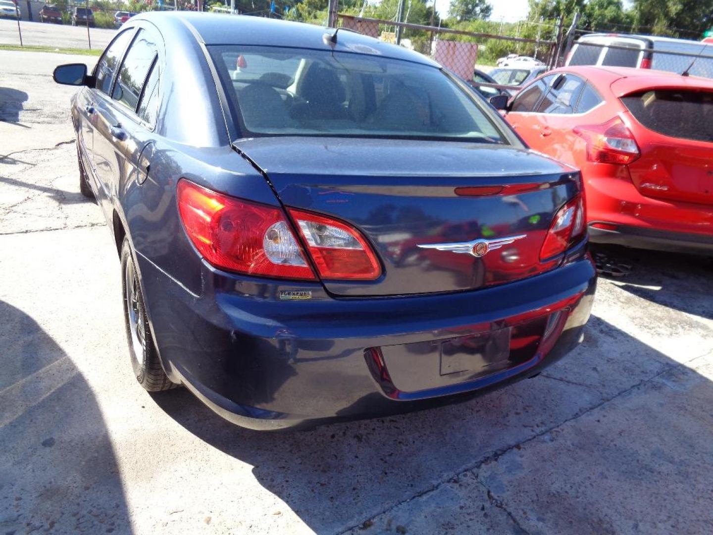 2007 BLUE CHRYSLER SEBRING Touring (1C3LC56R57N) with an 2.7L V6 DOHC 24V FFV engine, AUTOMATIC transmission, located at 2303 West Mt. Houston, Houston, Texas, 77038, (281) 507-3956, 29.771597, -95.339569 - Photo#2