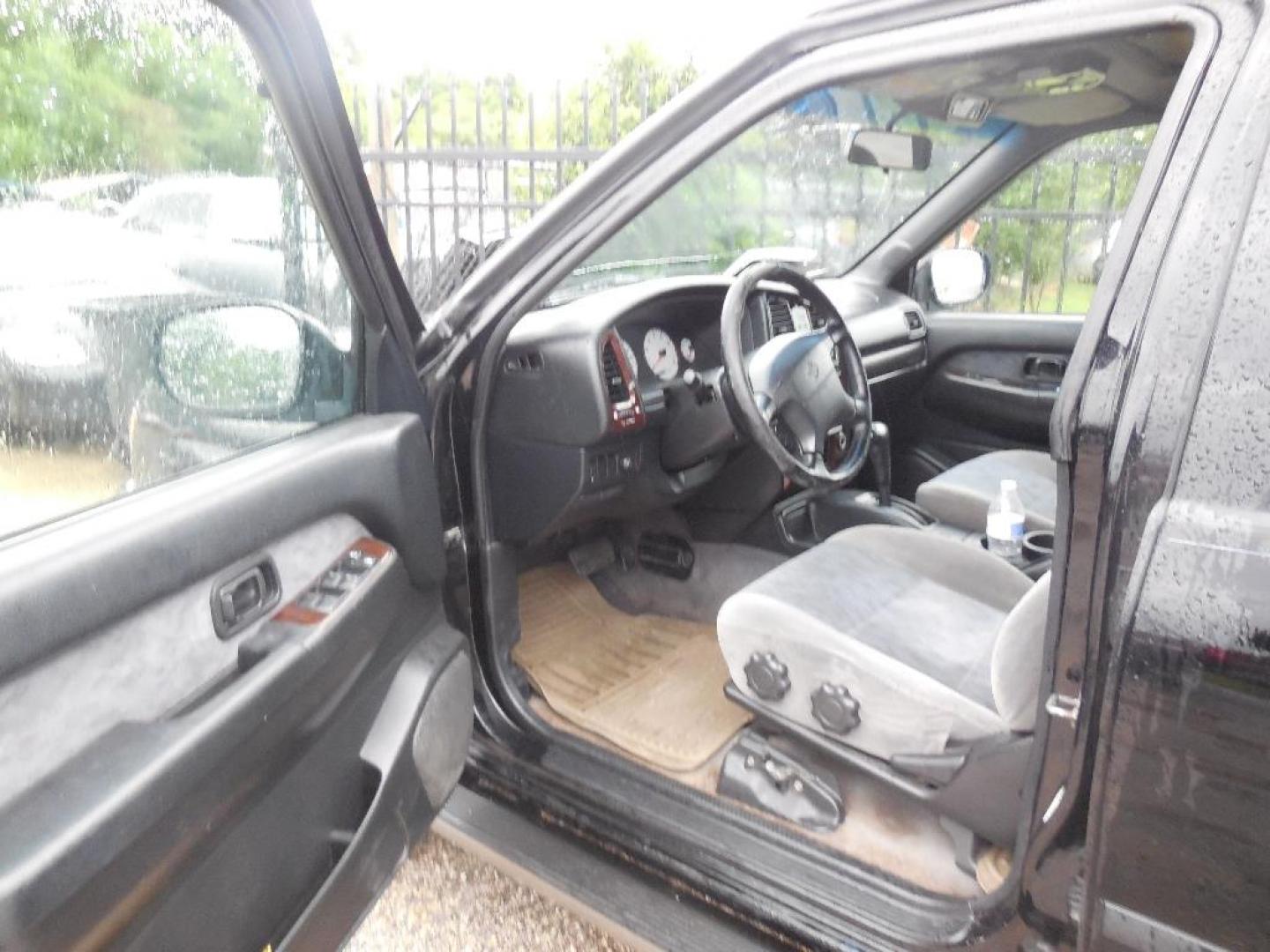 2001 BLACK NISSAN PATHFINDER SE 2WD (JN8DR09X21W) with an 3.5L V6 DOHC 24V engine, AUTOMATIC transmission, located at 2303 West Mt. Houston, Houston, Texas, 77038, (281) 507-3956, 29.771597, -95.339569 - Photo#1