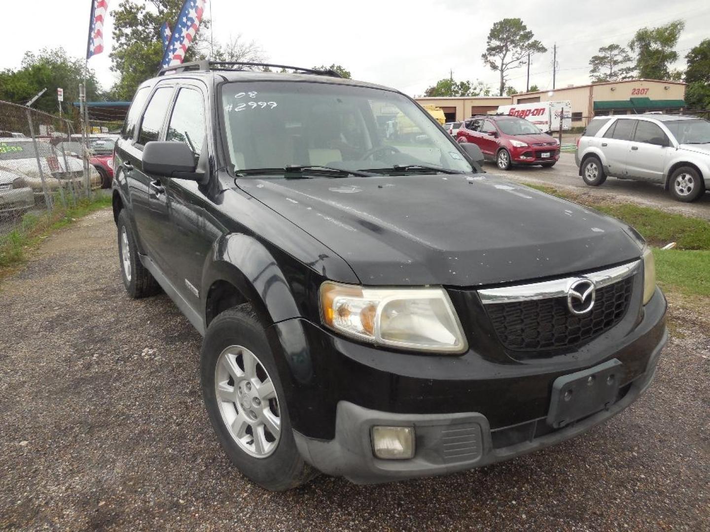 2008 BLACK MAZDA TRIBUTE s Grand Touring FWD (4F2CZ06128K) with an 3.0L V6 DOHC 24V engine, AUTOMATIC transmission, located at 2303 West Mt. Houston, Houston, Texas, 77038, (281) 507-3956, 29.771597, -95.339569 - Photo#0