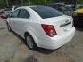 2012 WHITE CHEVROLET SONIC 2LT Sedan (1G1JC5SH9C4) with an 1.8L L4 DOHC 24V engine, AUTOMATIC transmission, located at 2303 West Mt. Houston, Houston, Texas, 77038, (281) 507-3956, 29.771597, -95.339569 - Photo#2