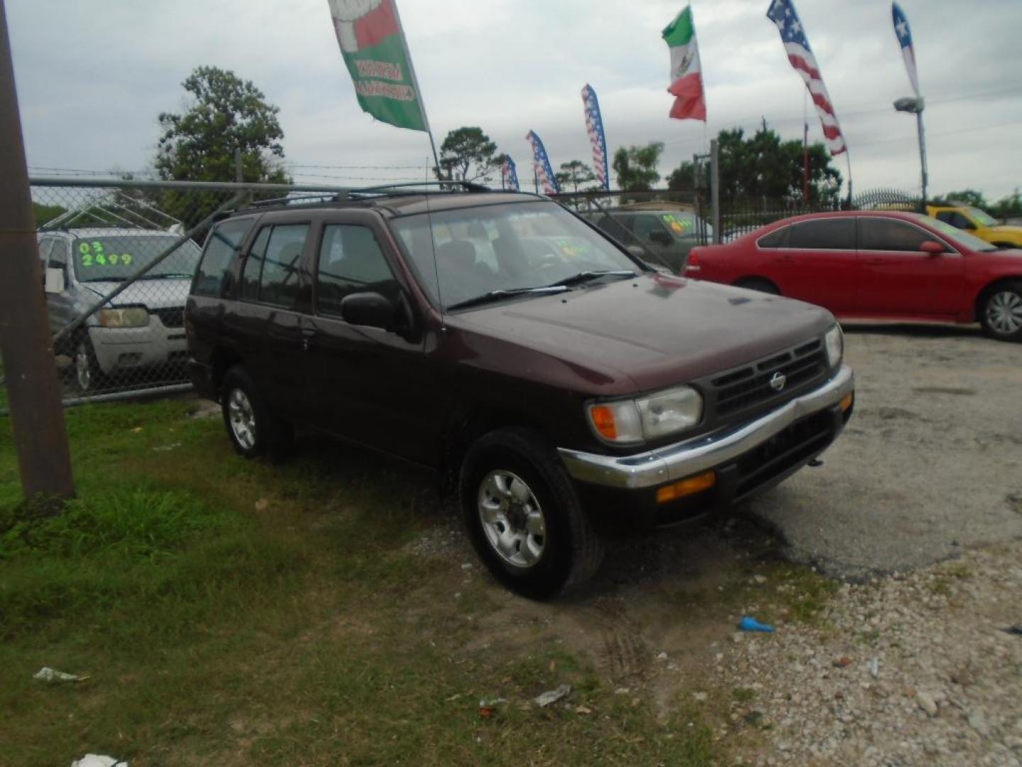 1998 MAROON NISSAN PATHFINDER XE 4WD (JN8AR05Y7WW) with an 3.3L V6 OHV 12V engine, AUTOMATIC transmission, located at 2303 West Mt. Houston, Houston, Texas, 77038, (281) 507-3956, 29.771597, -95.339569 - Photo#1