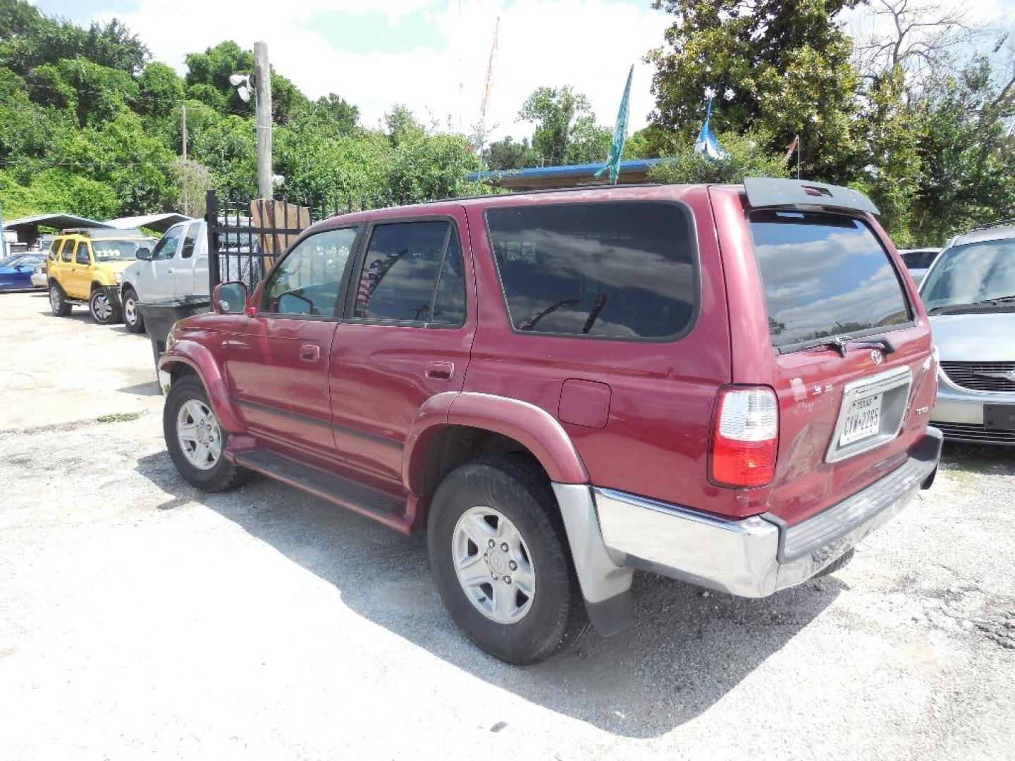 2002 RED TOYOTA 4RUNNER SR5 2WD (JT3GN86RX20) with an 3.4L V6 DOHC 24V engine, AUTOMATIC transmission, located at 2303 West Mt. Houston, Houston, 77038, (281) 507-3956, 29.771597, -95.339569 - Photo#2