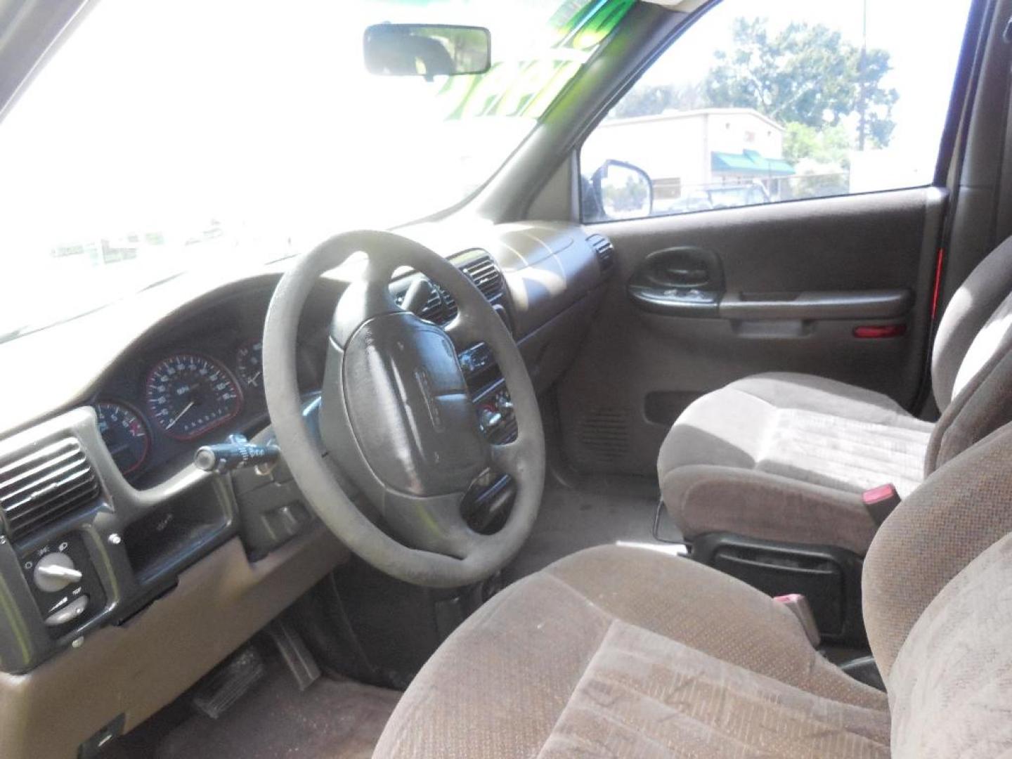 2000 BROWN PONTIAC MONTANA 4-Door Extended (1GMDX03E4YD) with an 3.4L V6 OHV 12V engine, AUTOMATIC transmission, located at 2303 West Mt. Houston, Houston, 77038, (281) 507-3956, 29.771597, -95.339569 - Photo#6