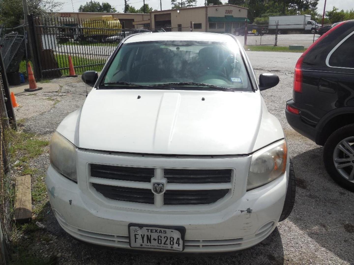 2007 WHITE DODGE CALIBER SE (1B3HB28B97D) with an 2.0L L4 DOHC 16V engine, AUTOMATIC transmission, located at 2303 West Mt. Houston, Houston, 77038, (281) 507-3956, 29.771597, -95.339569 - Photo#5