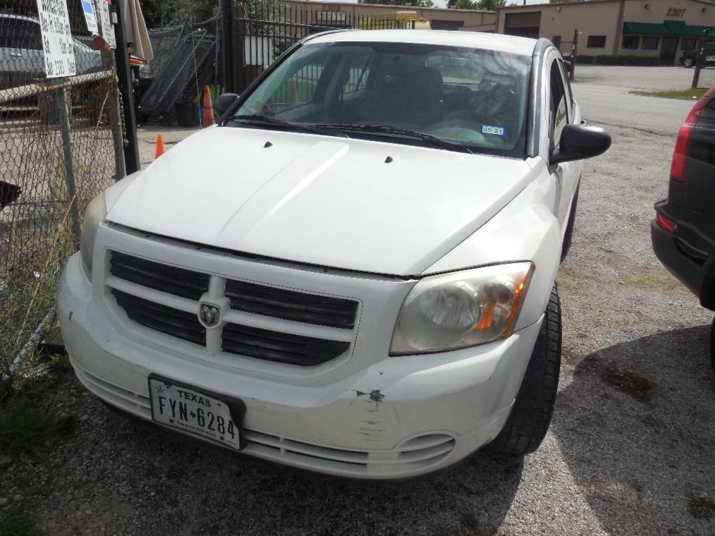 2007 WHITE DODGE CALIBER SE (1B3HB28B97D) with an 2.0L L4 DOHC 16V engine, AUTOMATIC transmission, located at 2303 West Mt. Houston, Houston, Texas, 77038, (281) 507-3956, 29.771597, -95.339569 - Photo#0